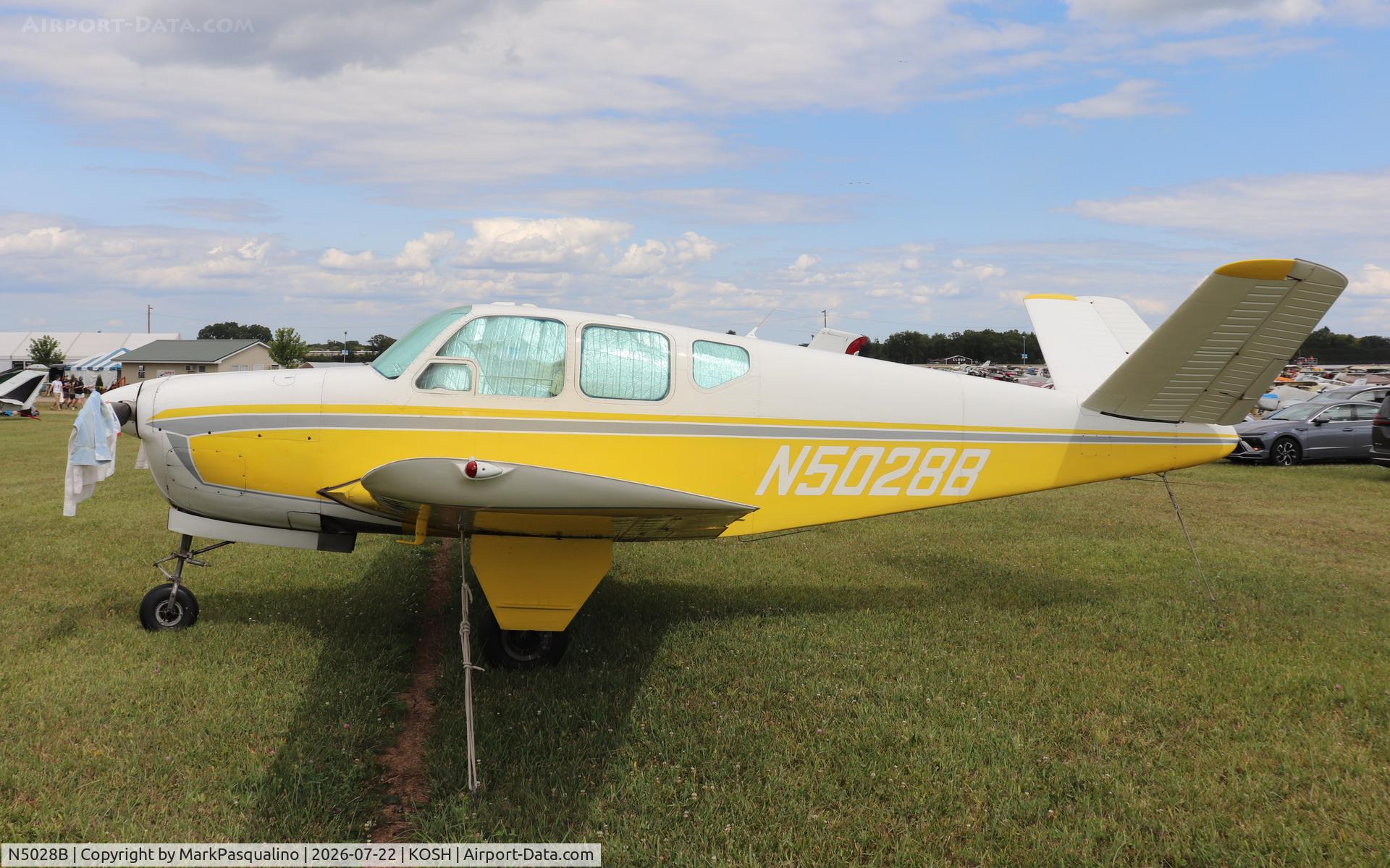 Aircraft N5028B, 1955 Beech F35 Bonanza, c/n D-4294, Beech F35, at KOSH, photo by MarkPasqualino
