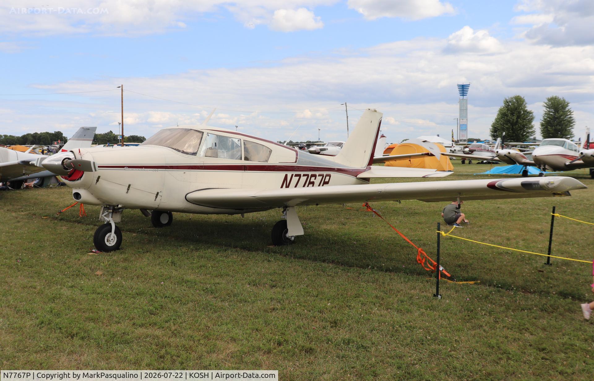Aircraft N7767P, Piper PA-24-250 Comanche, c/n 24-2983, Piper PA-24-250, at KOSH, photo by MarkPasqualino