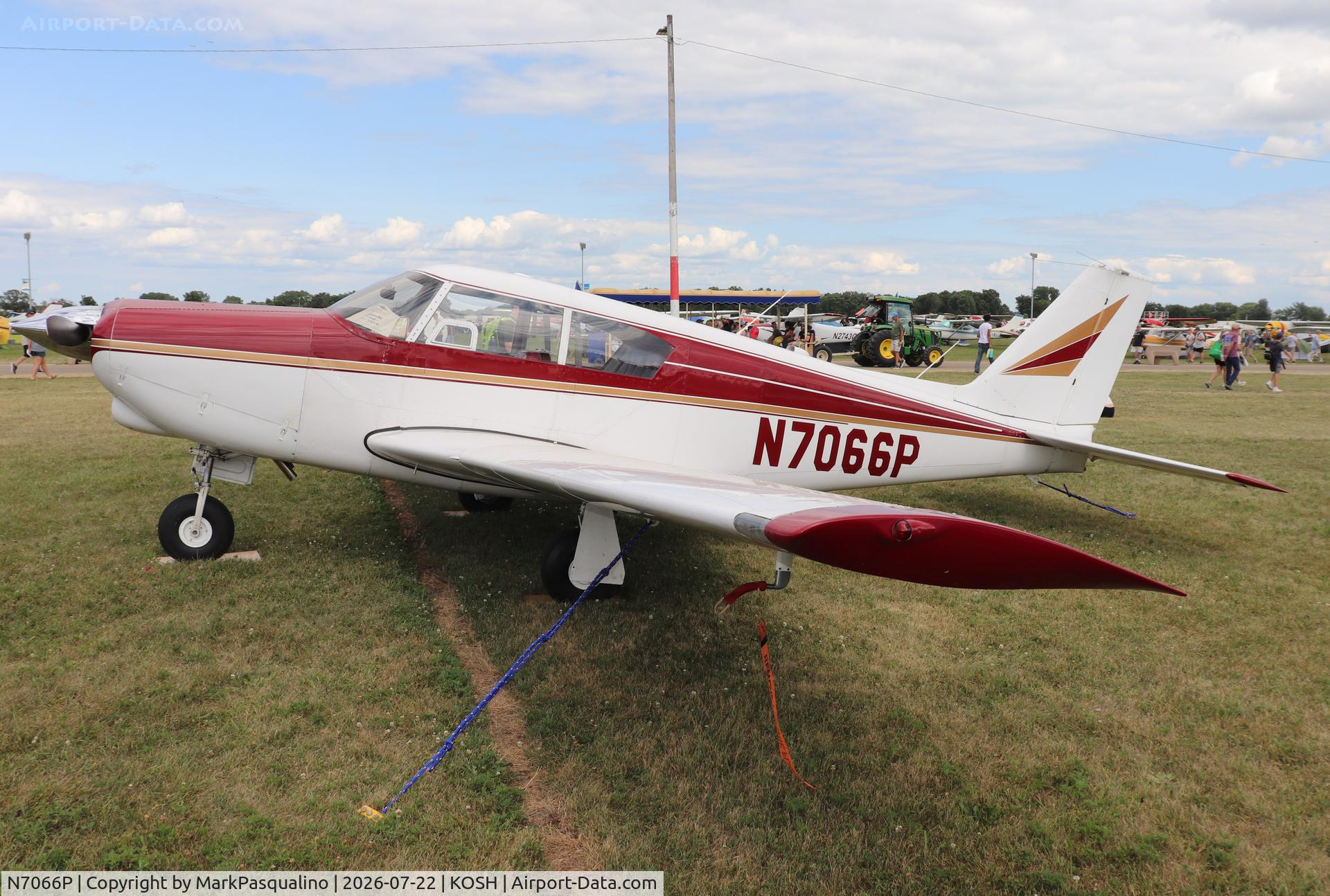 Aircraft N7066P, 1960 Piper PA-24, c/n 24-2218, Piper PA-24, at KOSH, photo by MarkPasqualino