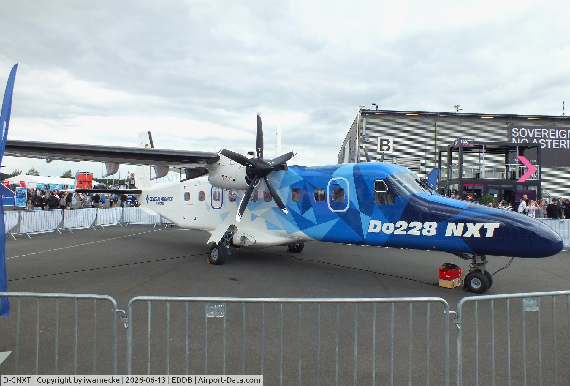 Aircraft D-CNXT, General Atomics AeroTec Dornier 228 NXT, c/n 8243, General Atomics AeroTec Dornier 228 NXT at ILA 2026, Berlin, at EDDB, photo by iwarnecke