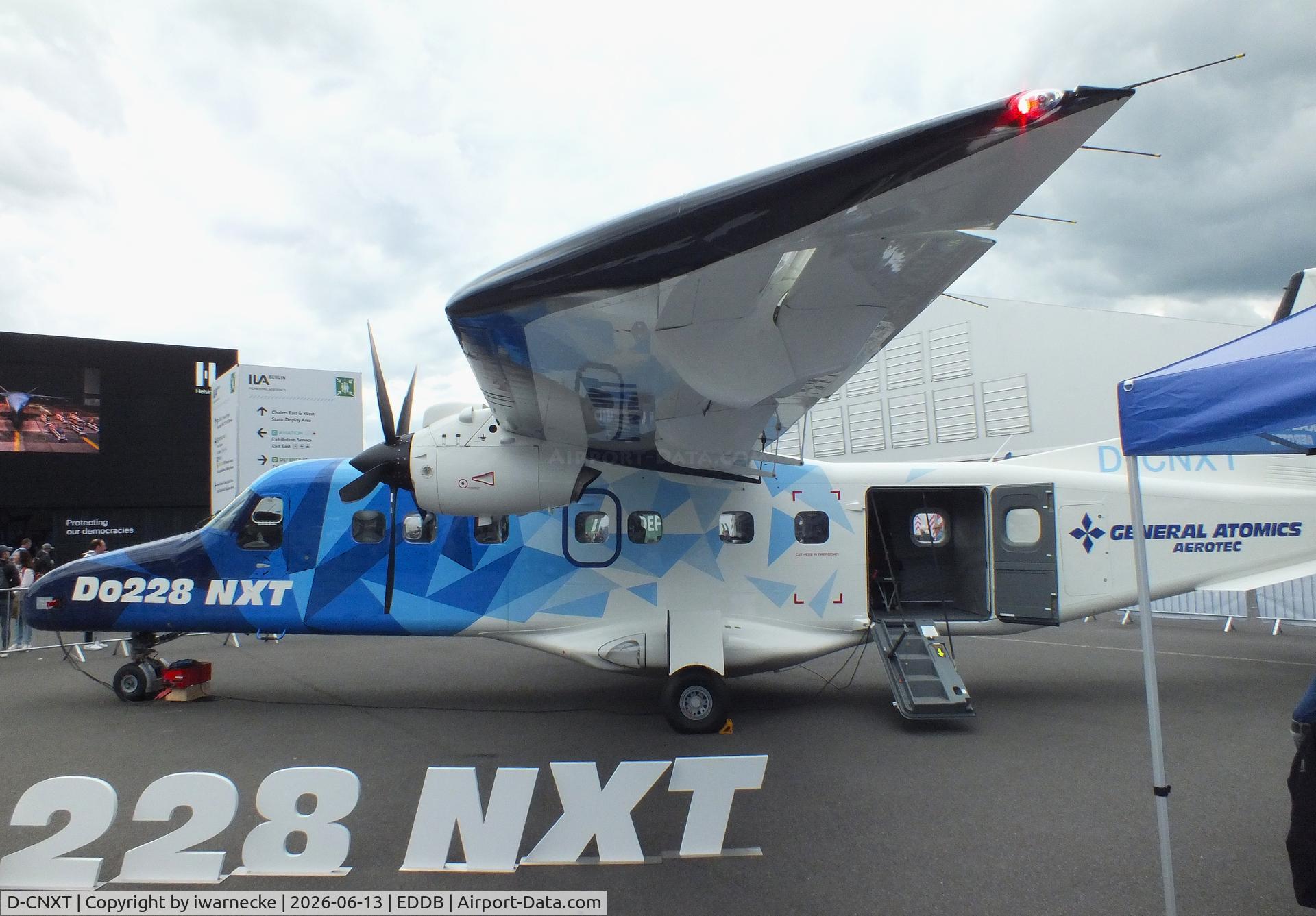 Aircraft D-CNXT, General Atomics AeroTec Dornier 228 NXT, c/n 8243, General Atomics AeroTec Dornier 228 NXT at ILA 2026, Berlin, at EDDB, photo by iwarnecke