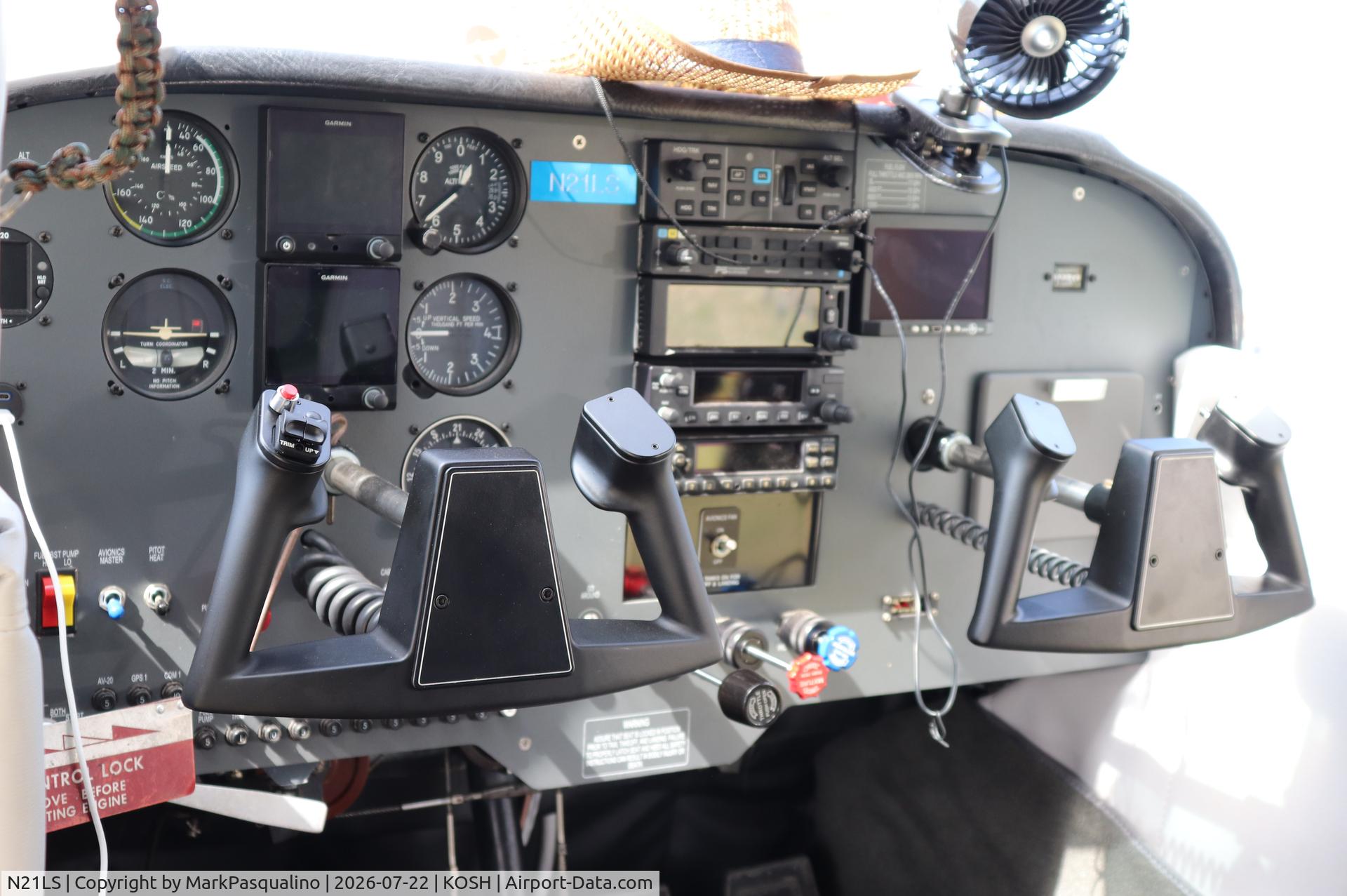 Aircraft N21LS, 1964 Cessna 172E, c/n 17251817, Cessna 172E, at KOSH, photo by MarkPasqualino