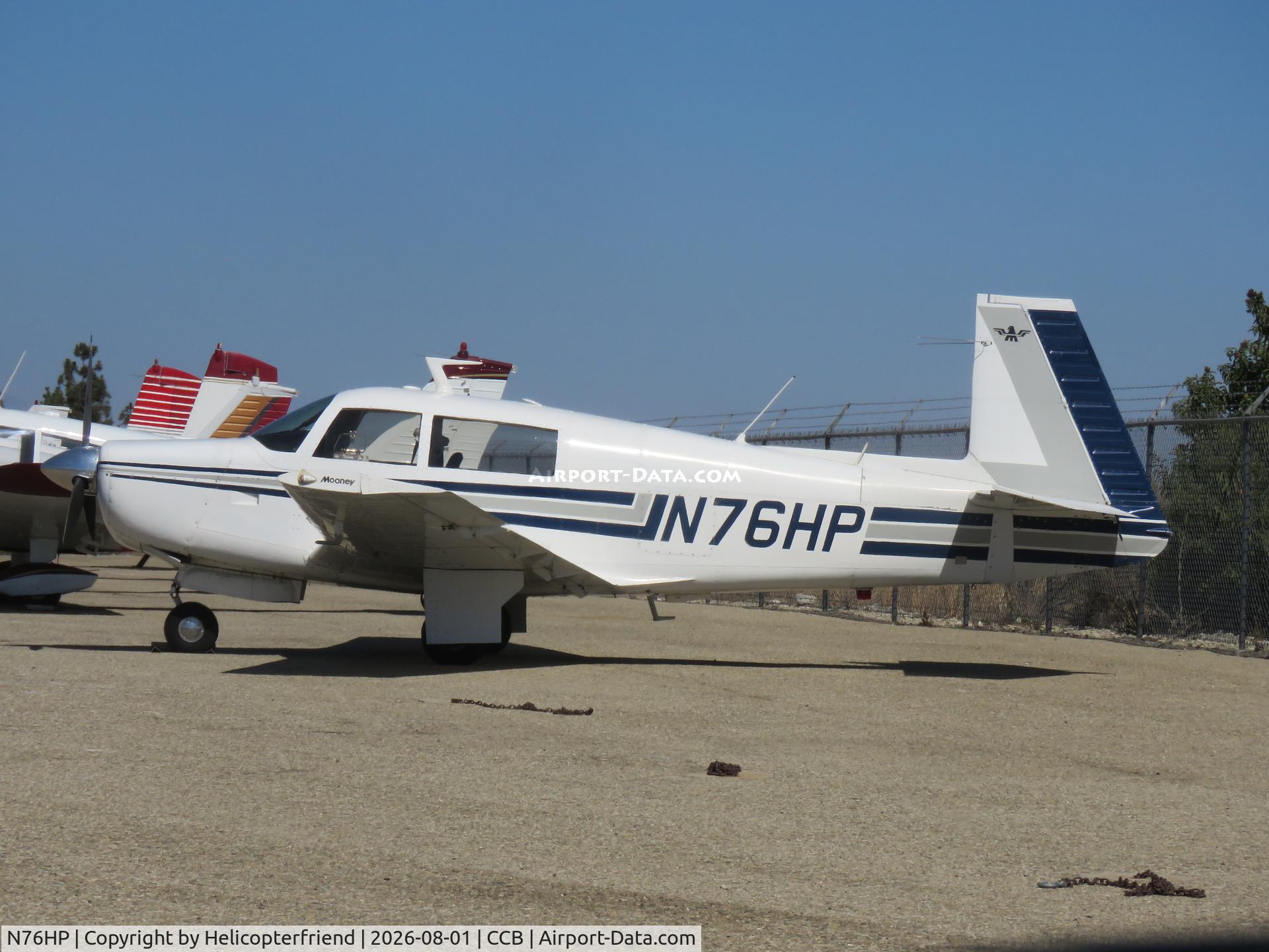 Aircraft N76HP, 1970 Mooney M20F Executive, c/n 700010, Parked by south fence, at CCB, photo by Helicopterfriend