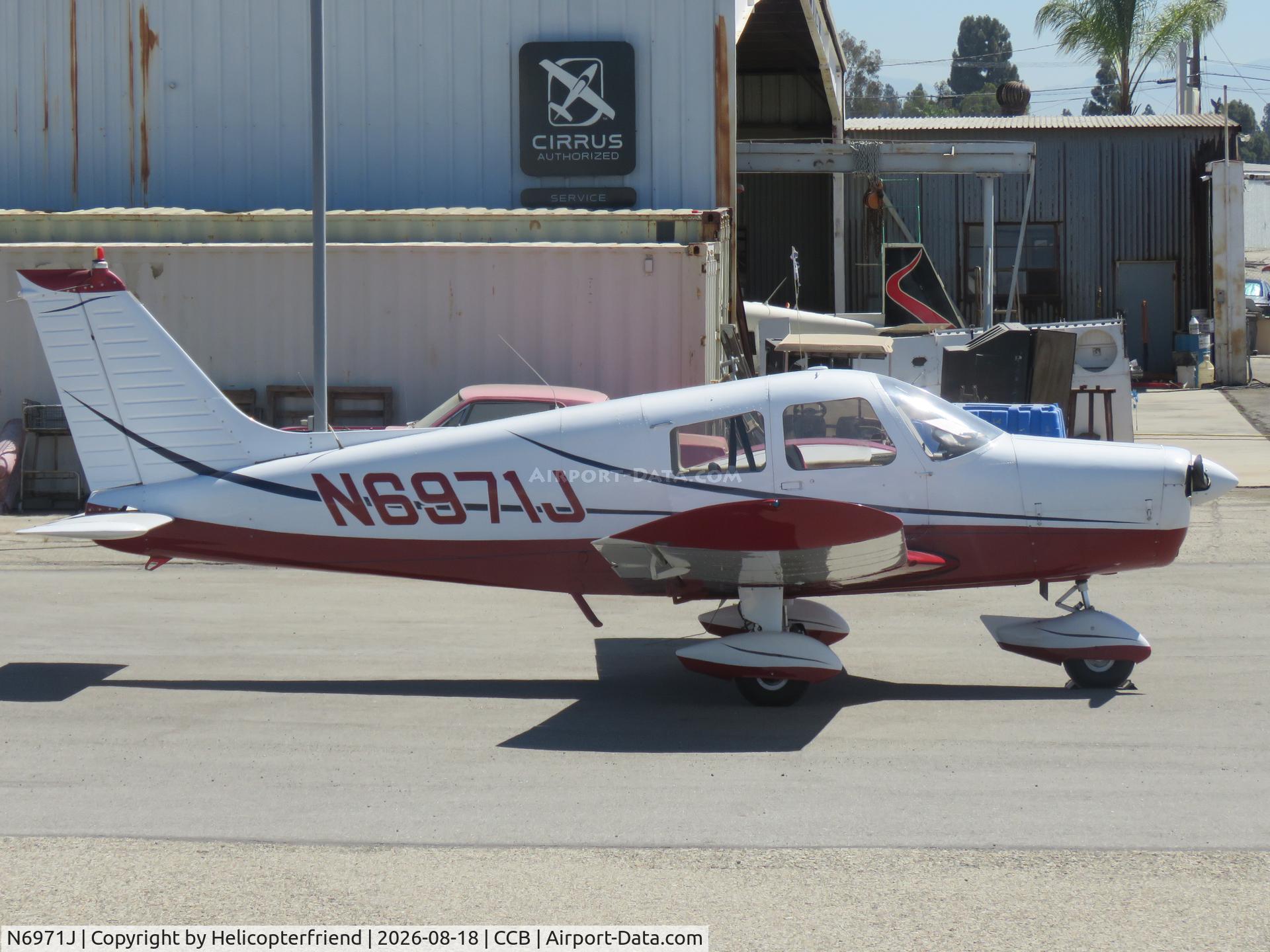 Aircraft N6971J, 1976 Piper PA-28-140, c/n 28-7625263, Parked near mechanic shop, at CCB, photo by Helicopterfriend