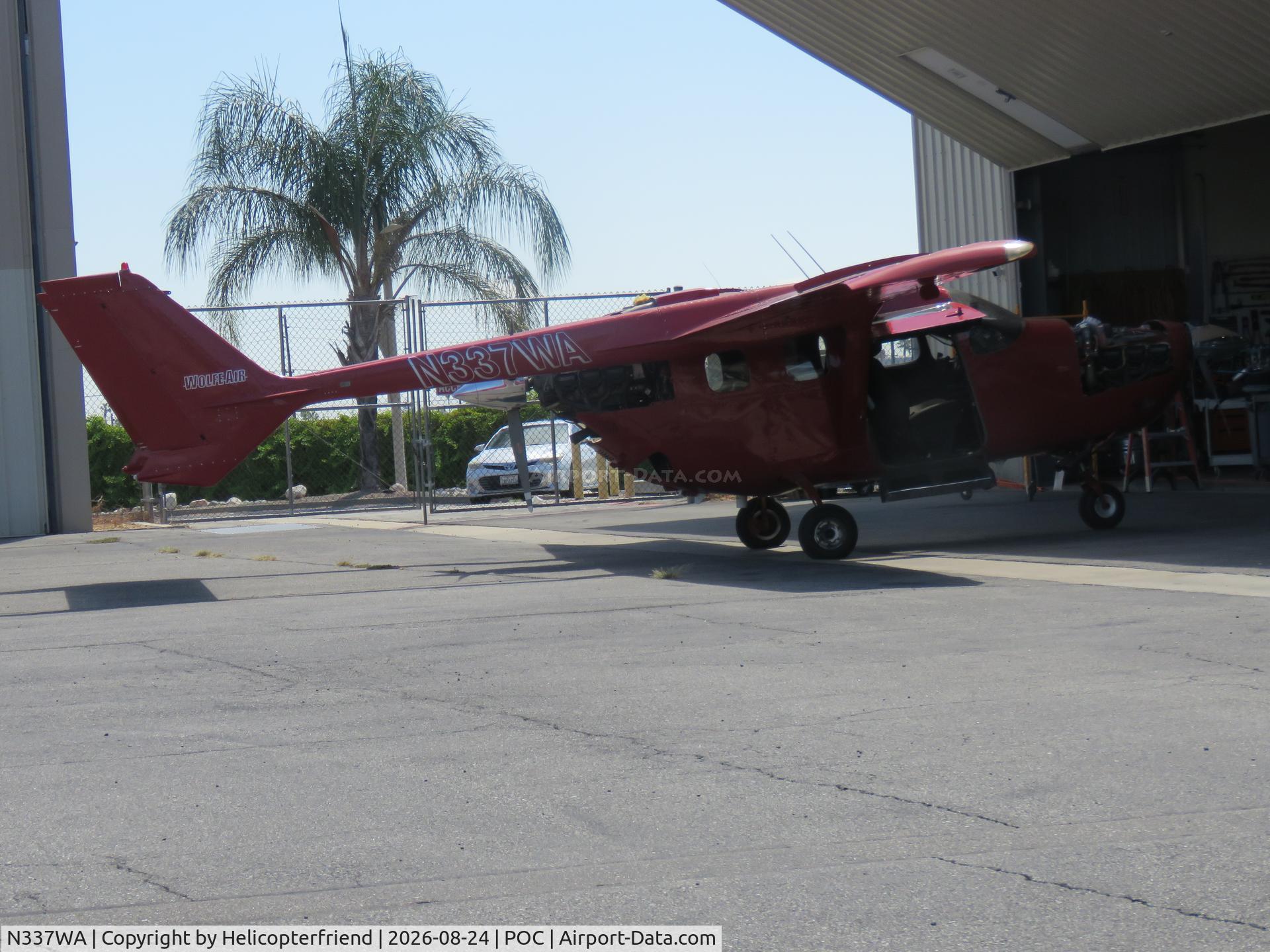 Aircraft N337WA, 1975 Cessna 337G Super Skymaster, c/n 33701651, Parked in the shade, at POC, photo by Helicopterfriend
