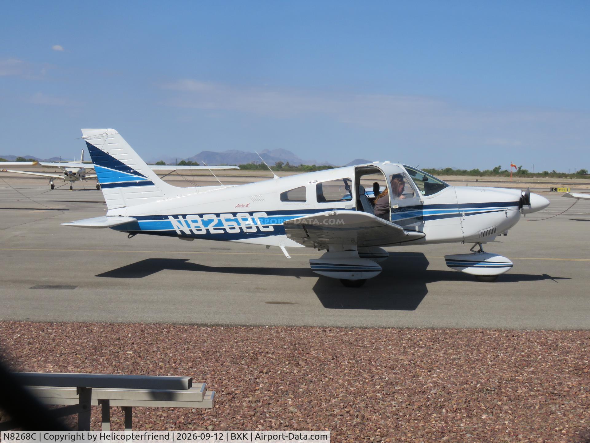 Aircraft N8268C, 1980 Piper PA-28-181, c/n 28-8190041, Loading up getting ready to leave, at BXK, photo by Helicopterfriend