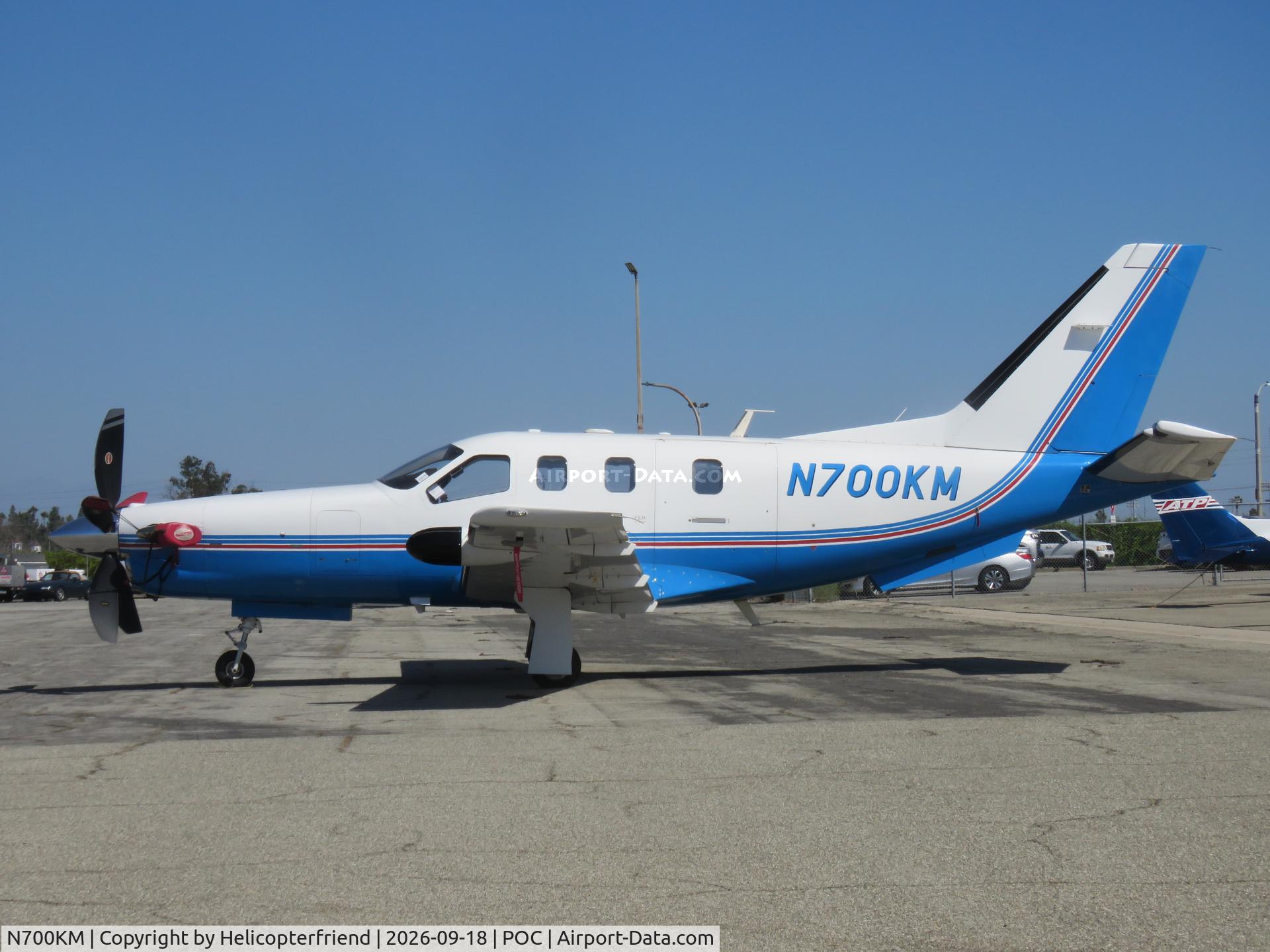 Aircraft N700KM, 2000 Socata TBM-700, c/n 158, Parked near ATP parking, at POC, photo by Helicopterfriend