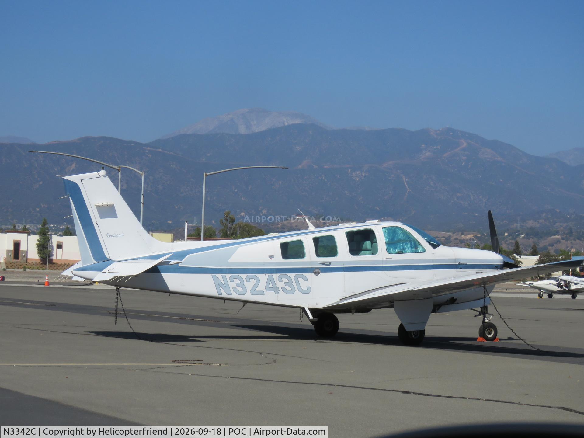 Aircraft N3342C, 1955 Beech F35 Bonanza, c/n D-4008, Parked in transit parking, at POC, photo by Helicopterfriend
