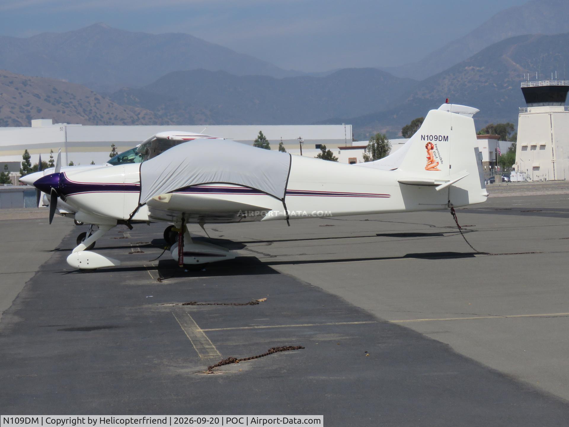 Aircraft N109DM, 1997 Vans RV-6A, c/n MAN-1, Covered and parked in transit parking, at POC, photo by Helicopterfriend