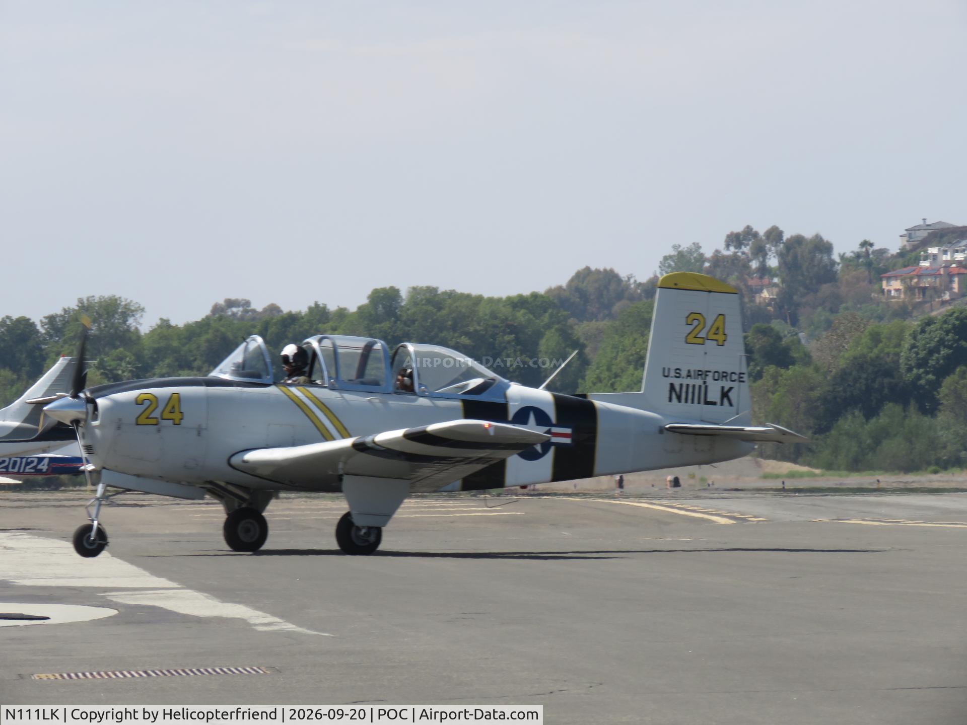 Aircraft N111LK, 1955 Beech A45, c/n G-724, Taxiing into transit parking, at POC, photo by Helicopterfriend