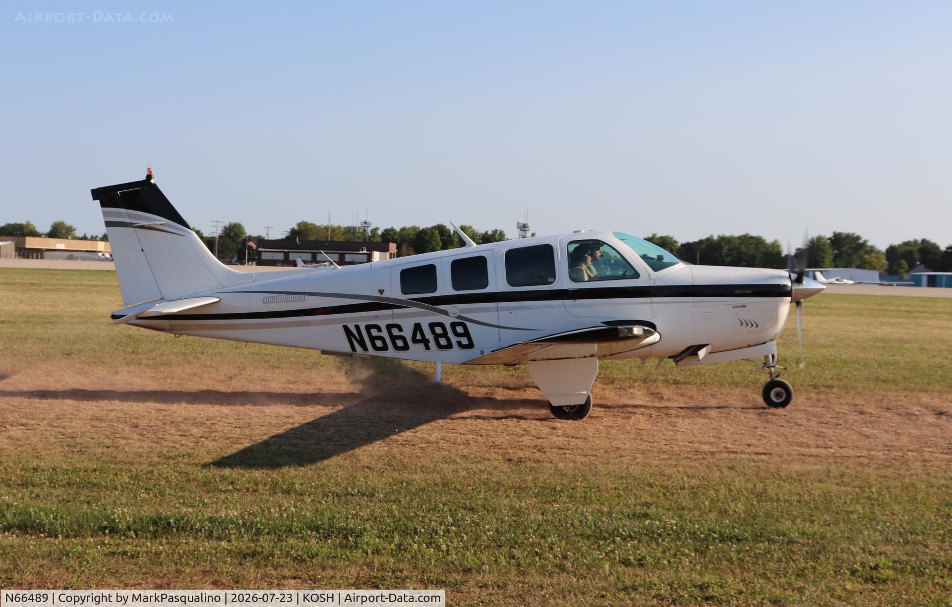 Aircraft N66489, 1983 Beech A36 Bonanza 36, c/n E-2073, Beech A36, at KOSH, photo by MarkPasqualino