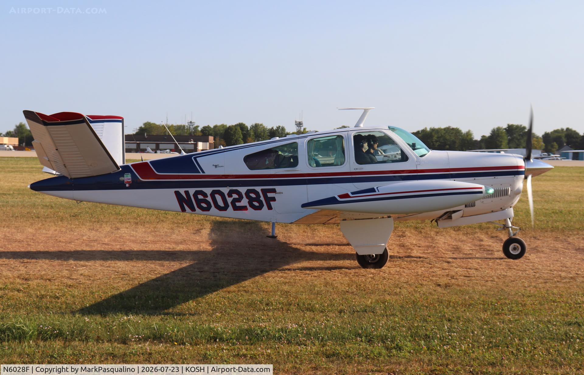 Aircraft N6028F, 1965 Beech S35 Bonanza, c/n D-7808, Beech S35, at KOSH, photo by MarkPasqualino