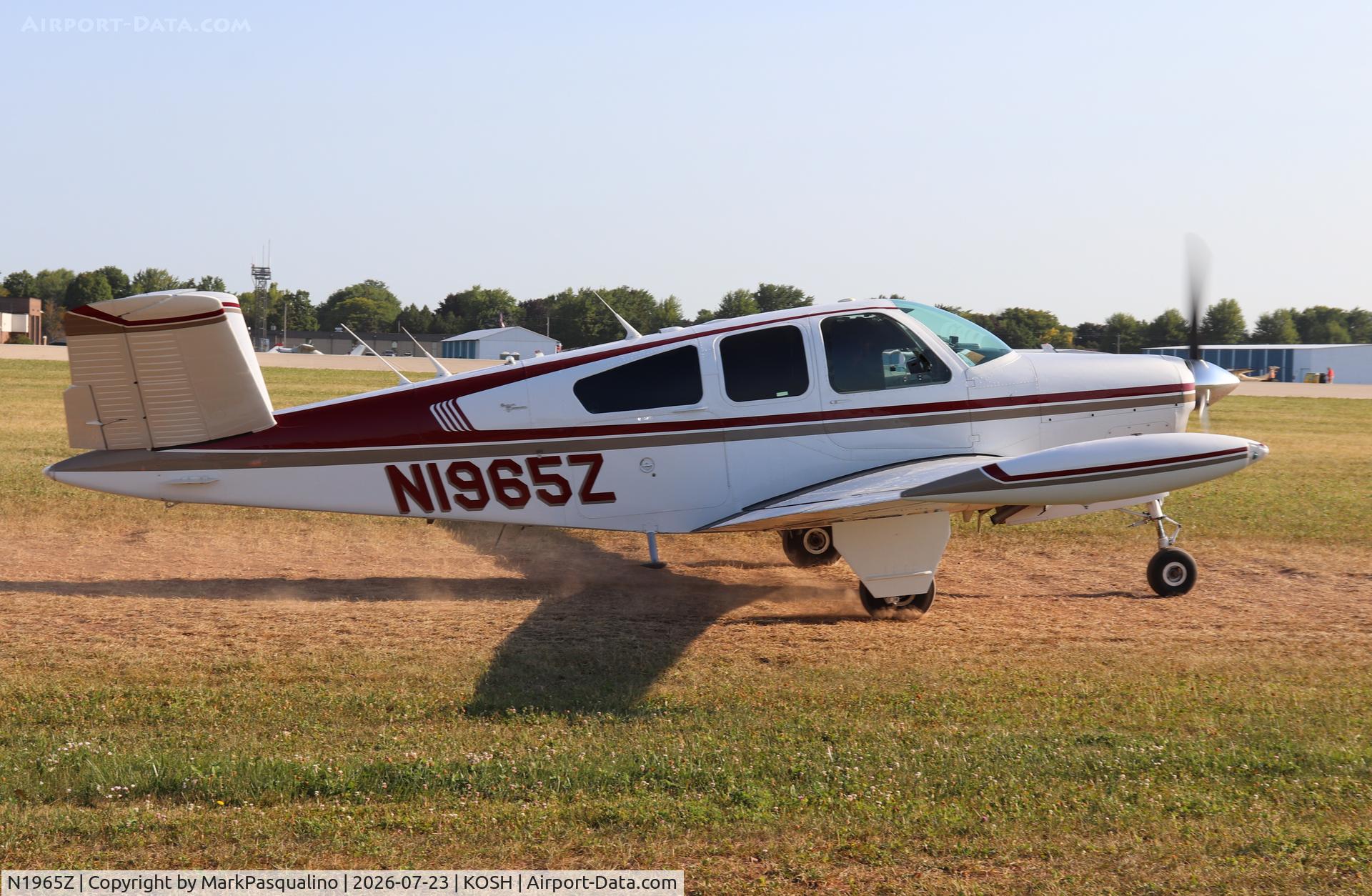 Aircraft N1965Z, 1965 Beech S35 Bonanza, c/n D-7805, Beech S35, at KOSH, photo by MarkPasqualino