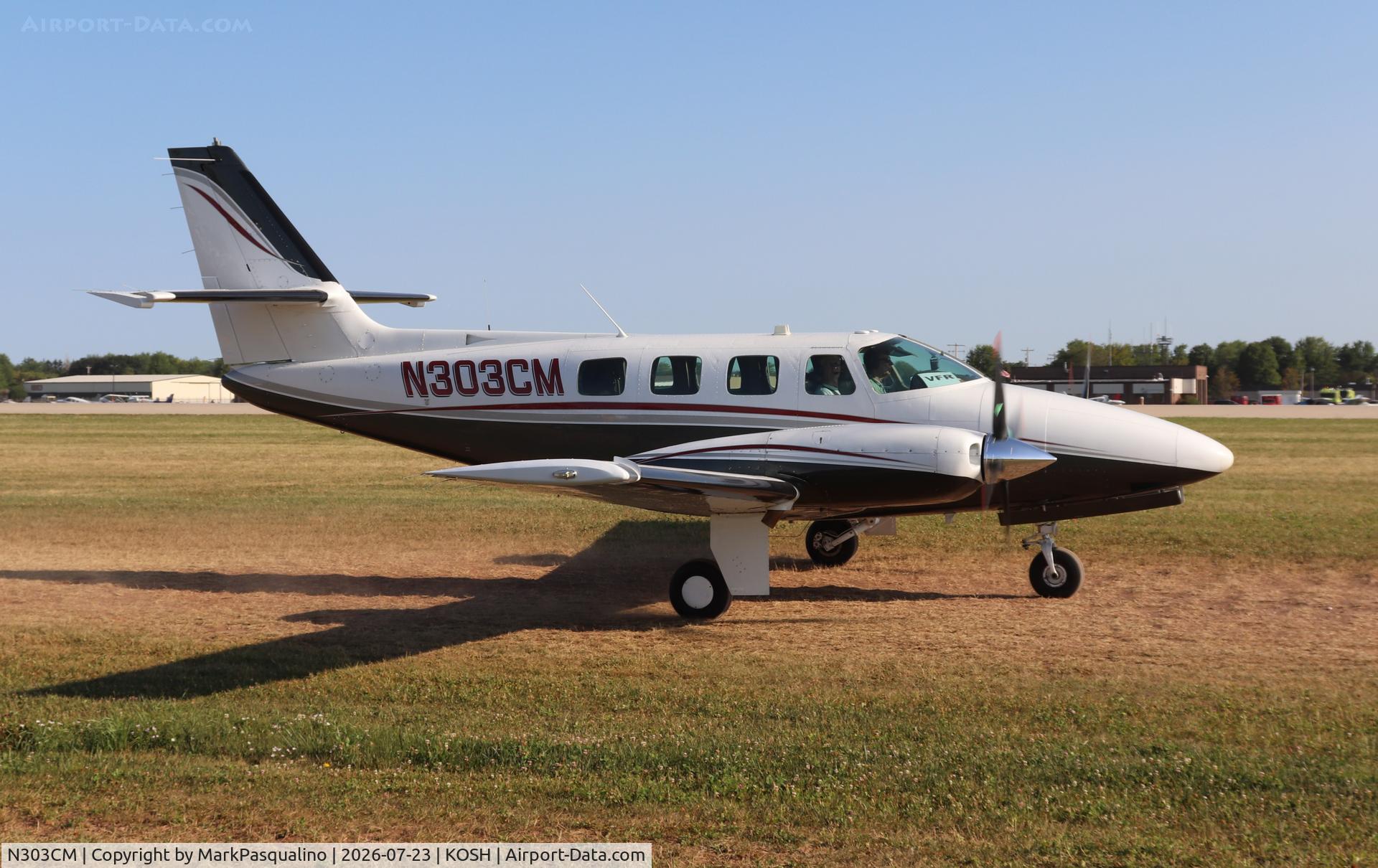 Aircraft N303CM, 1984 Cessna T303 Crusader, c/n T30300296, Cessna T303, at KOSH, photo by MarkPasqualino