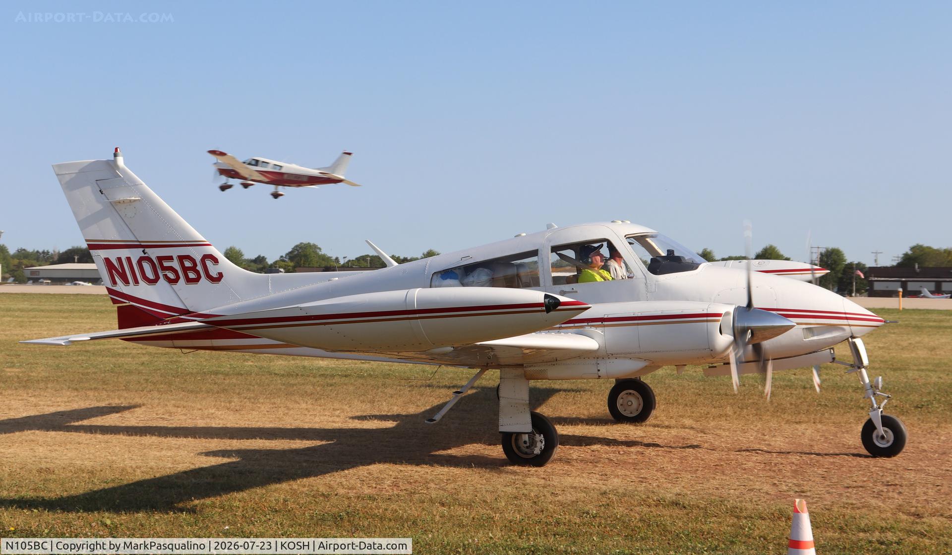 Aircraft N105BC, 1966 Cessna 310K, c/n 310K0232, Cessna 310K, at KOSH, photo by MarkPasqualino