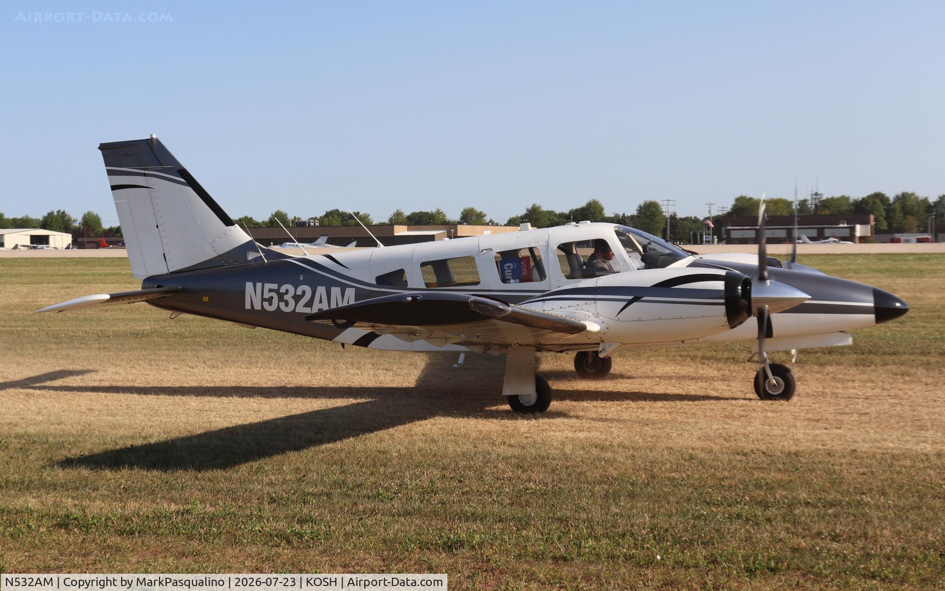 Aircraft N532AM, 1975 Piper PA-34-200T, c/n 34-7570191, Piper PA-34-200T, at KOSH, photo by MarkPasqualino