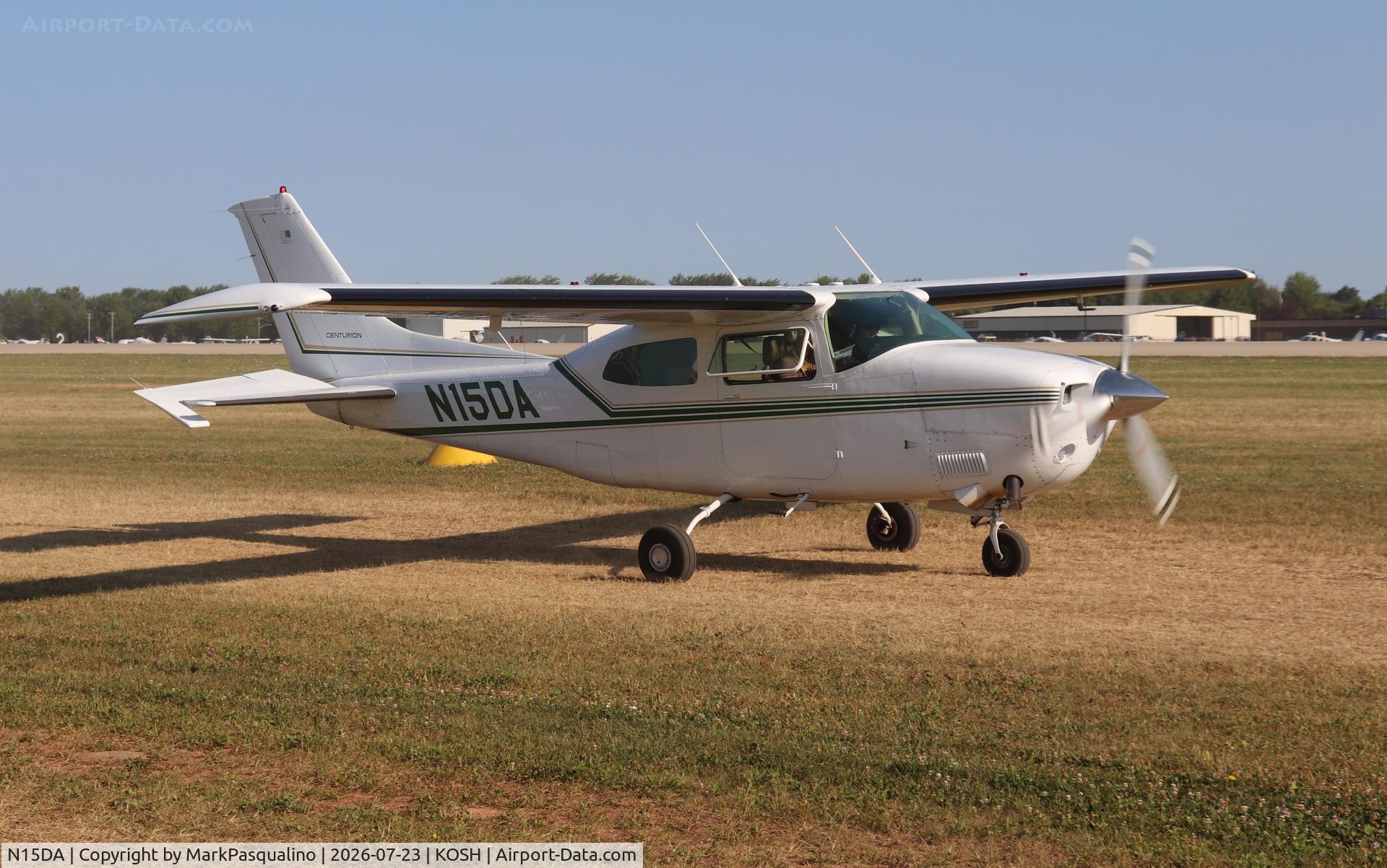 Aircraft N15DA, Cessna T210M Turbo Centurion, c/n 21061765, Cessna T210M, at KOSH, photo by MarkPasqualino