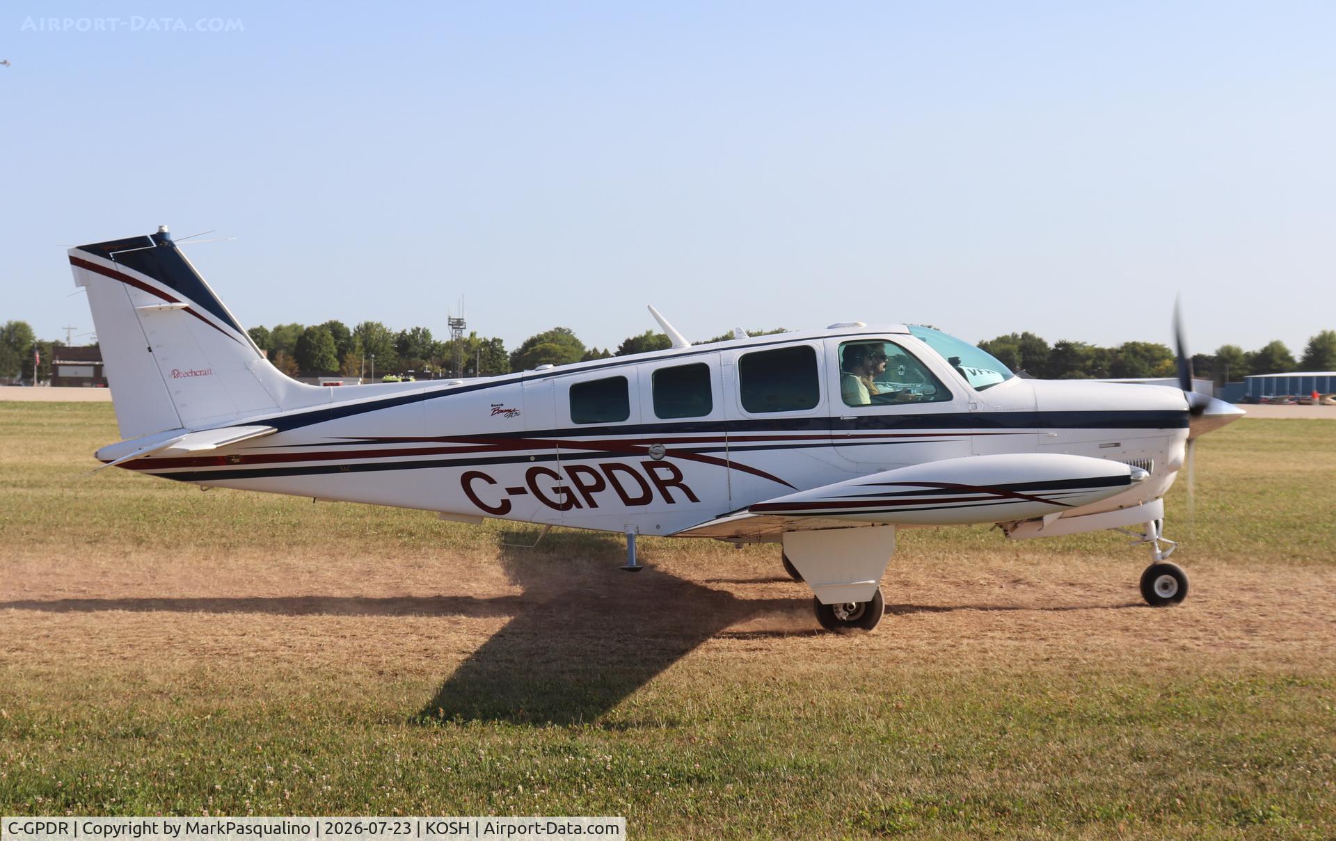 Aircraft C-GPDR, 1999 Beech A36 Bonanza 36, c/n E-3250, Beech A36, at KOSH, photo by MarkPasqualino