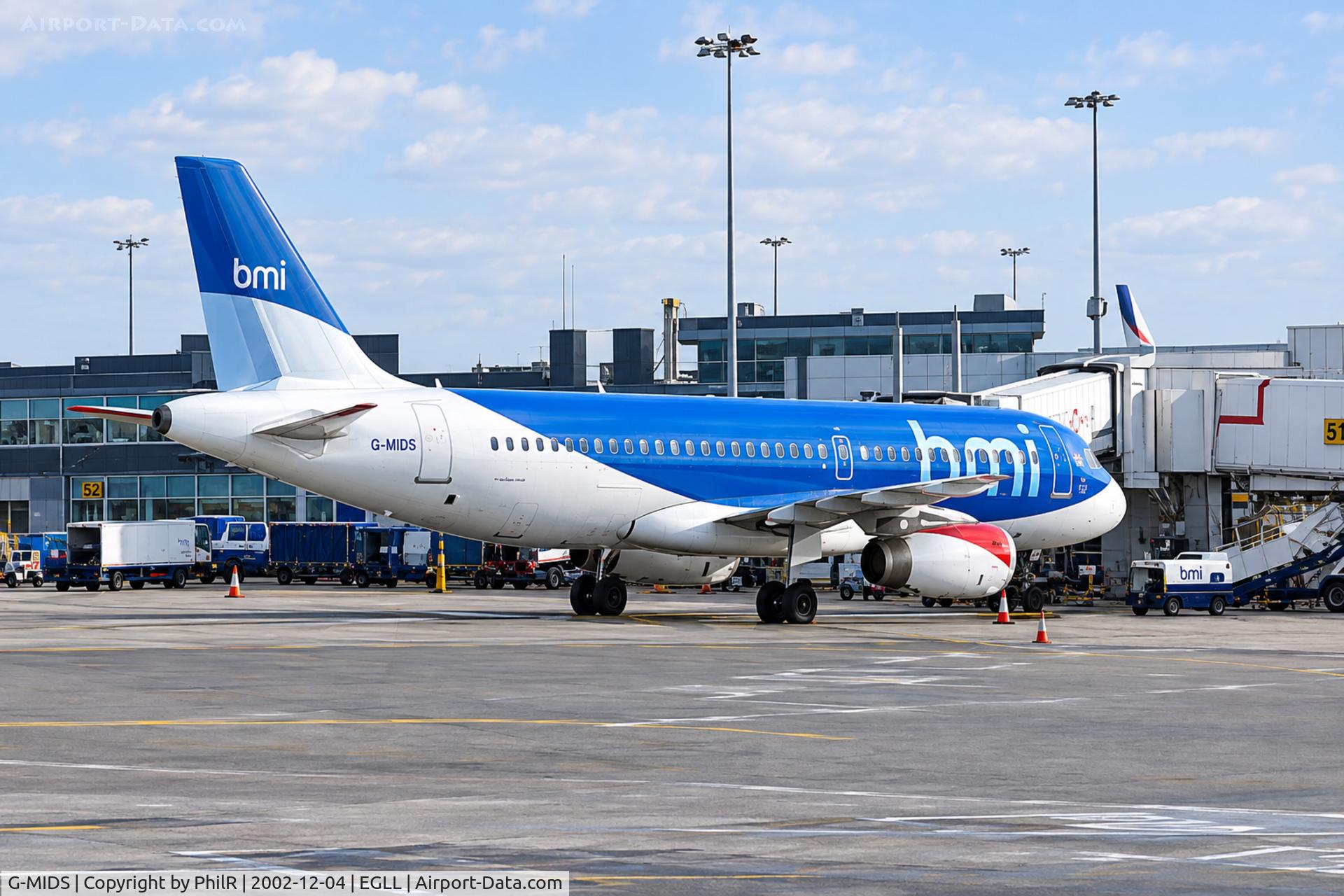 Aircraft G-MIDS, 2001 Airbus A320-232, c/n 1424, G-MIDS 2001 A320-200 BMI LHR, at EGLL, photo by PhilR