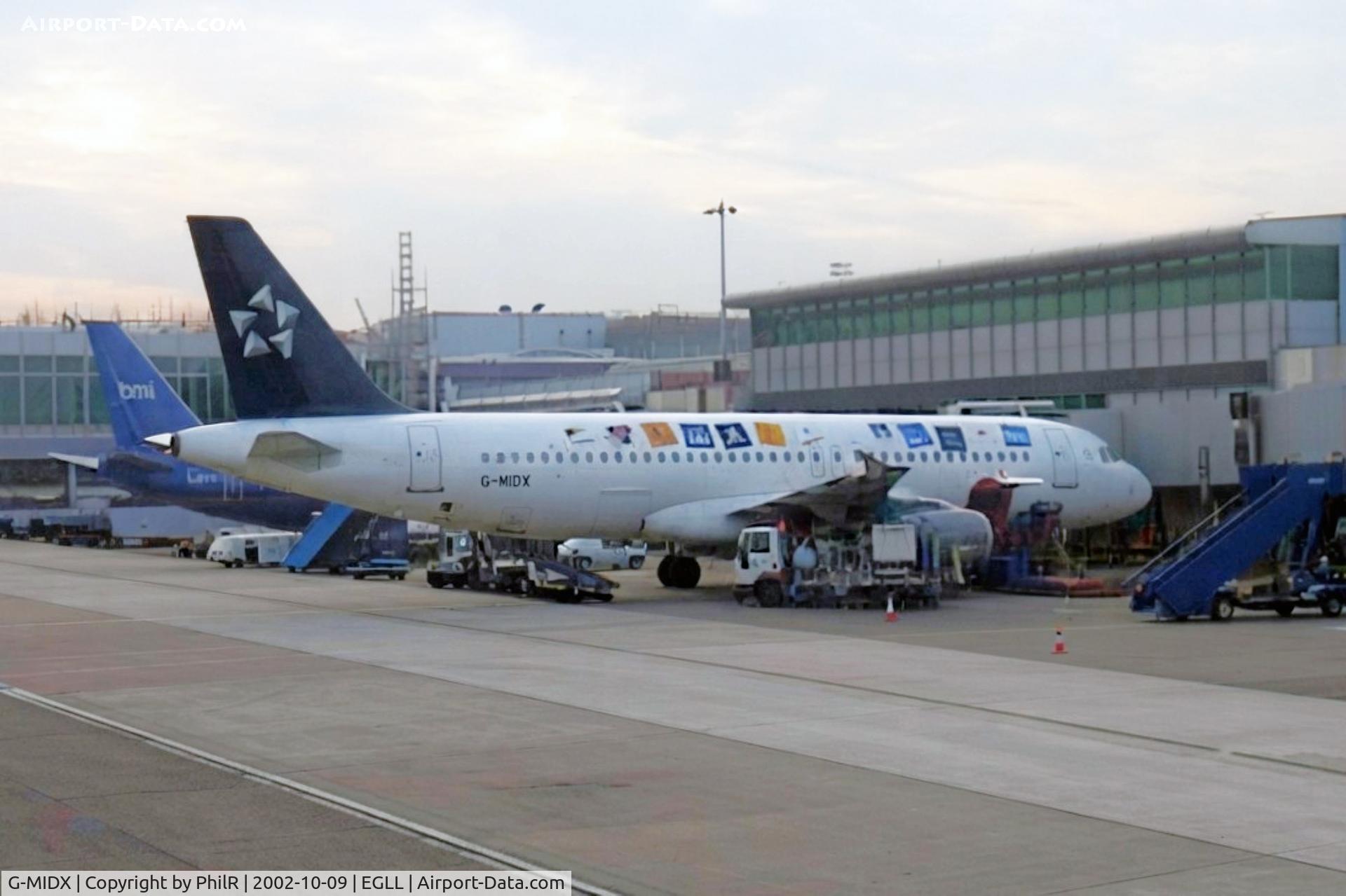 Aircraft G-MIDX, 2000 Airbus A320-232, c/n 1177, G-MIDX 2000 A320-200 BMI LHR, at EGLL, photo by PhilR