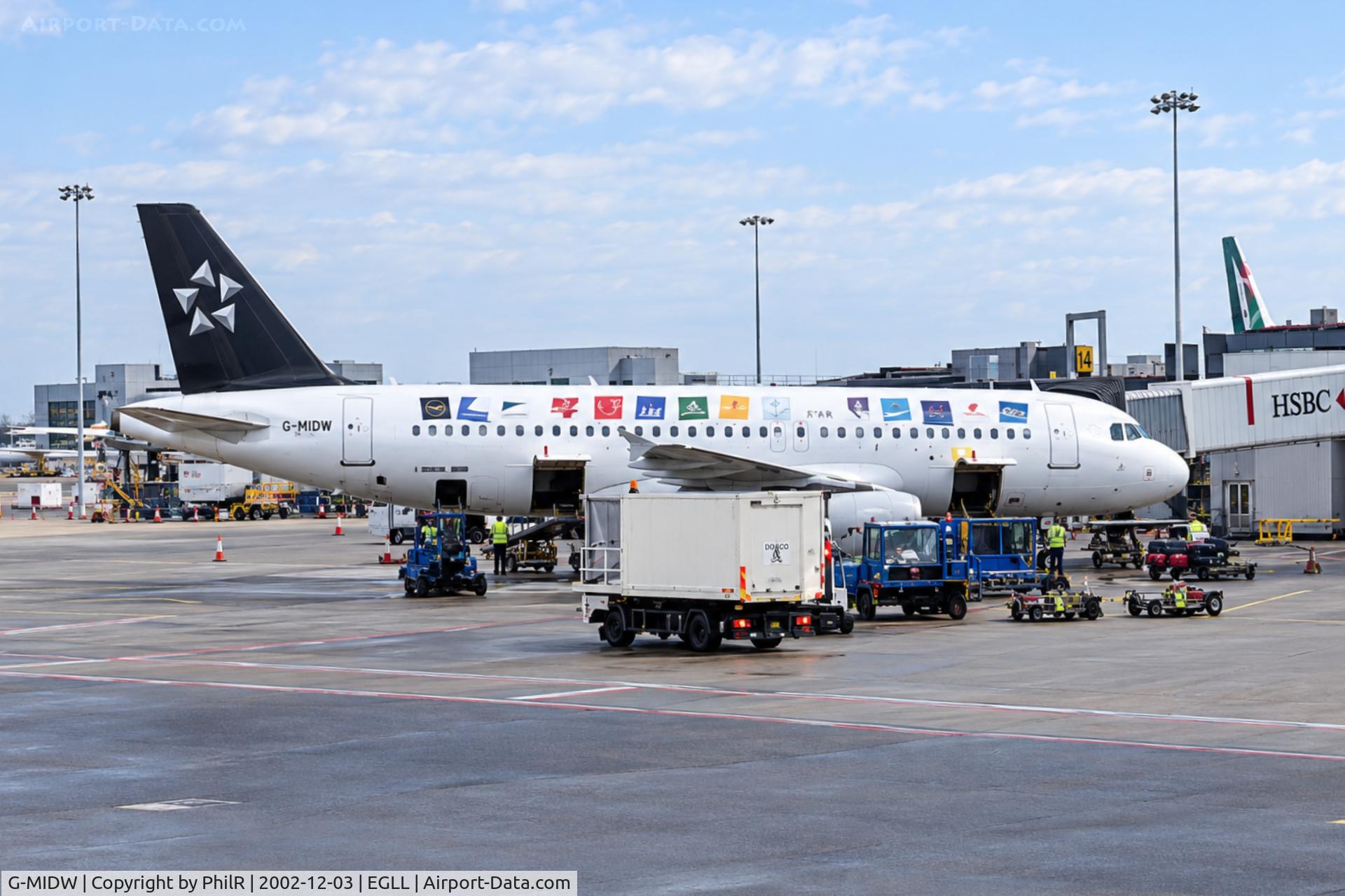 Aircraft G-MIDW, 2000 Airbus A320-232, c/n 1183, G-MIDW 2000 A320-200 BMI LHR, at EGLL, photo by PhilR