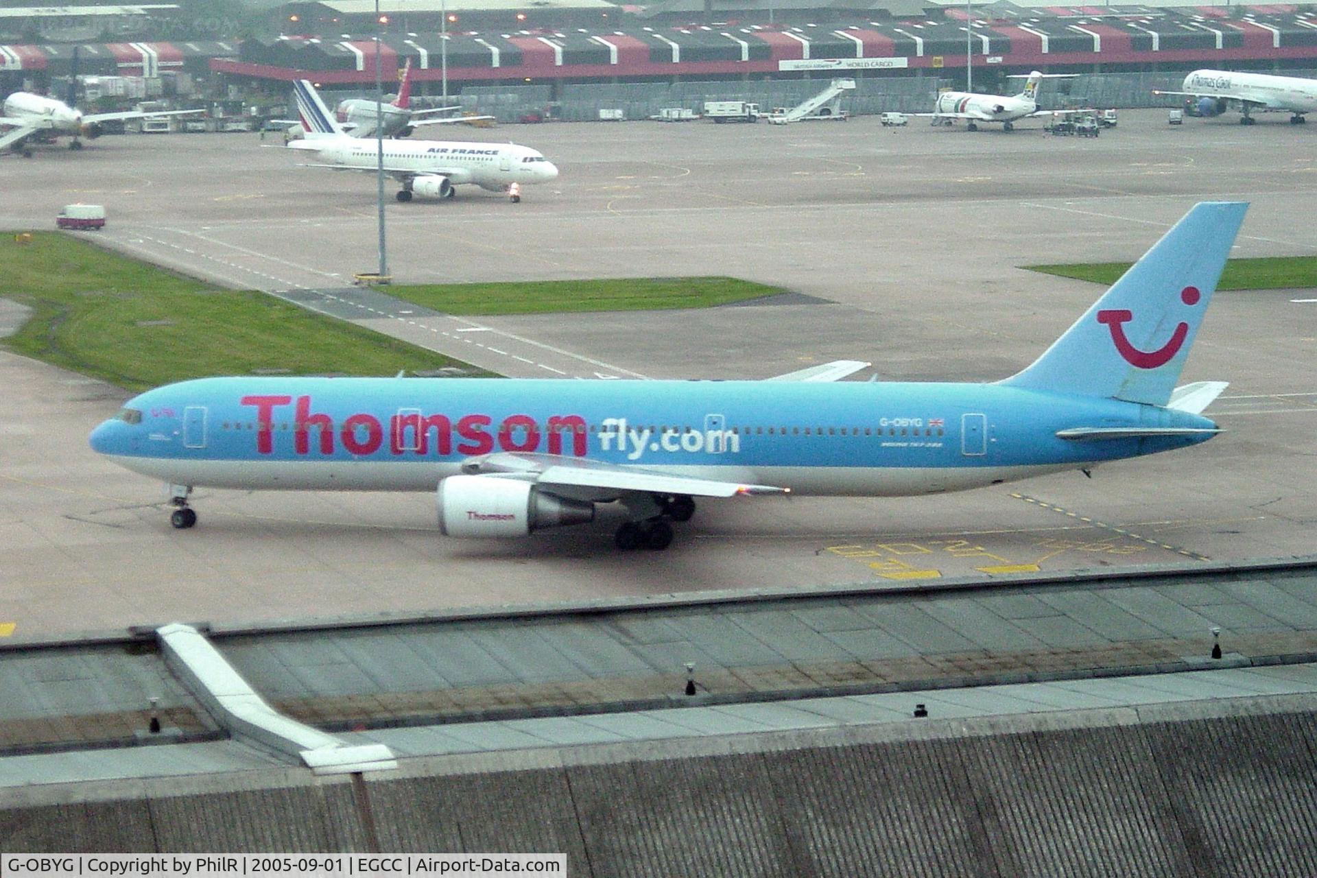 Aircraft G-OBYG, 1999 Boeing 767-304, c/n 29137 l/n 733, G-OBYG 1998 B767-300 Thomson MAN, at EGCC, photo by PhilR