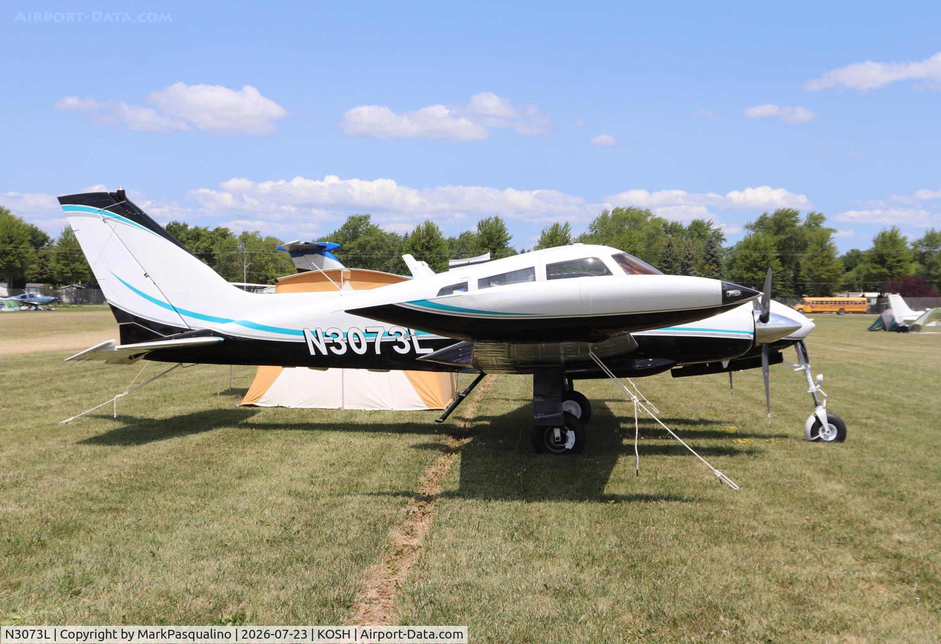 Aircraft N3073L, 1965 Cessna 310J, c/n 310J0073, Cessna 310J, at KOSH, photo by MarkPasqualino