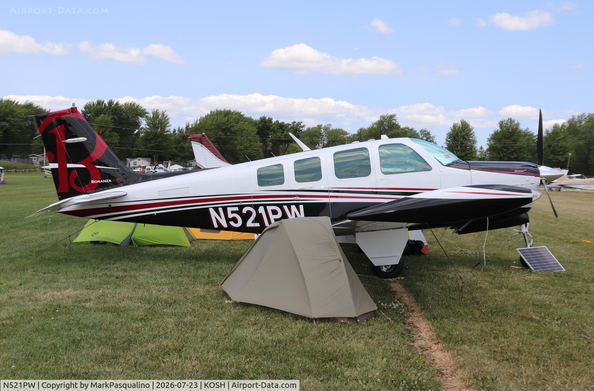Aircraft N521PW, 1988 Beech A36 Bonanza 36, c/n E-2434, Beech A36, at KOSH, photo by MarkPasqualino
