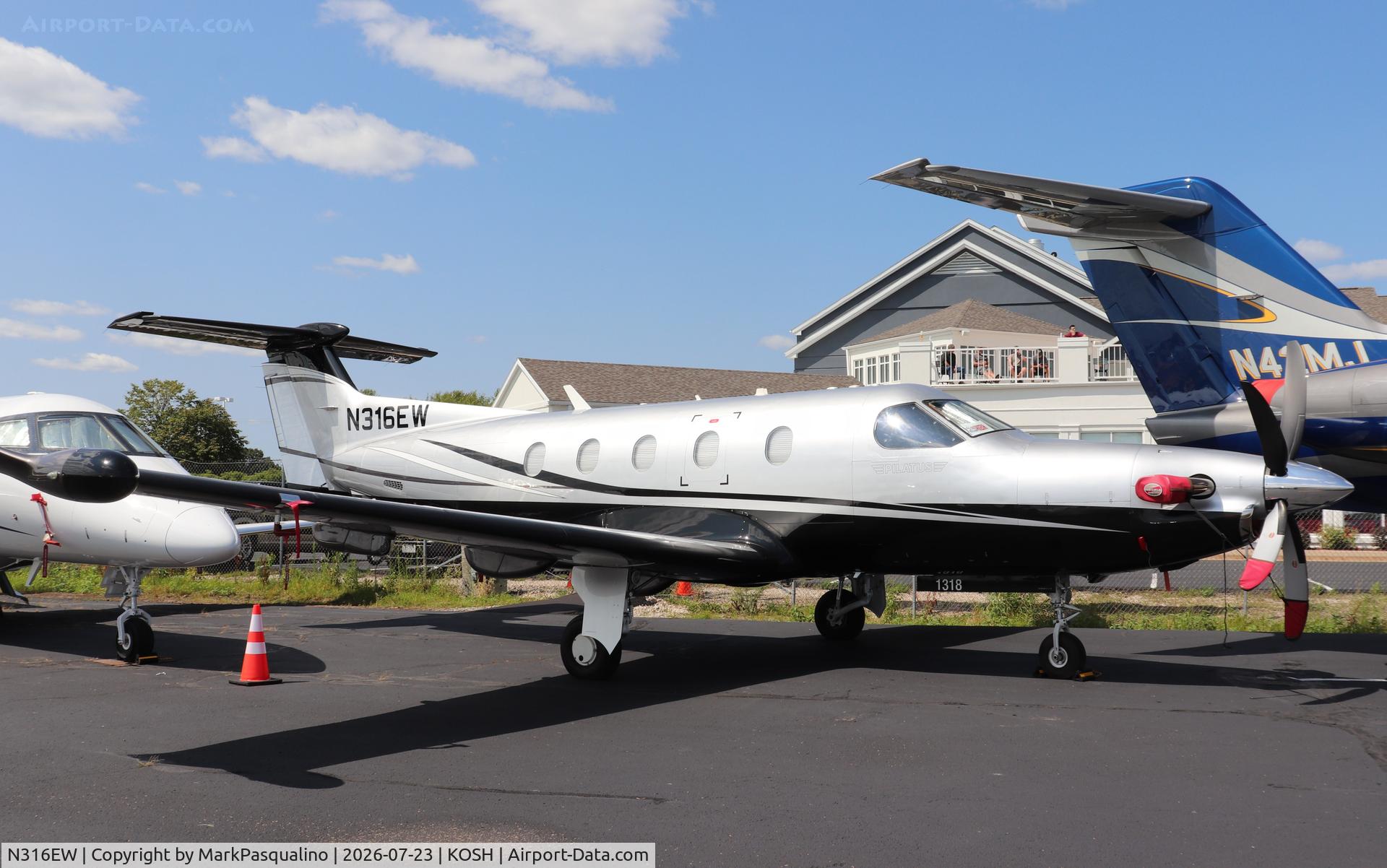 Aircraft N316EW, 2011 Pilatus PC-12/47E, c/n 1318, Pilatus PC-12/47E, at KOSH, photo by MarkPasqualino
