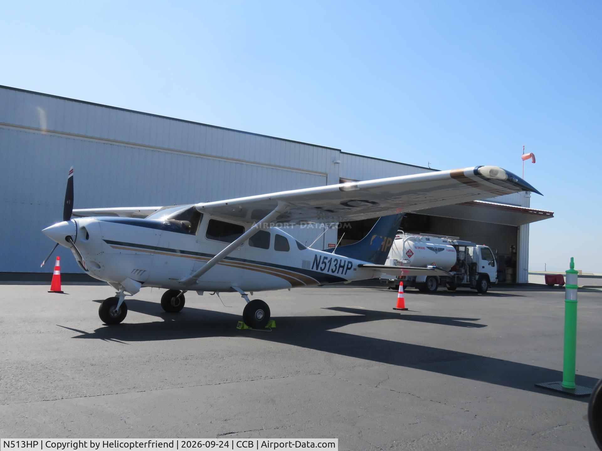 Aircraft N513HP, 2001 Cessna T206H Turbo Stationair, c/n T20608285, Parked near Ontario PD hanger, at CCB, photo by Helicopterfriend