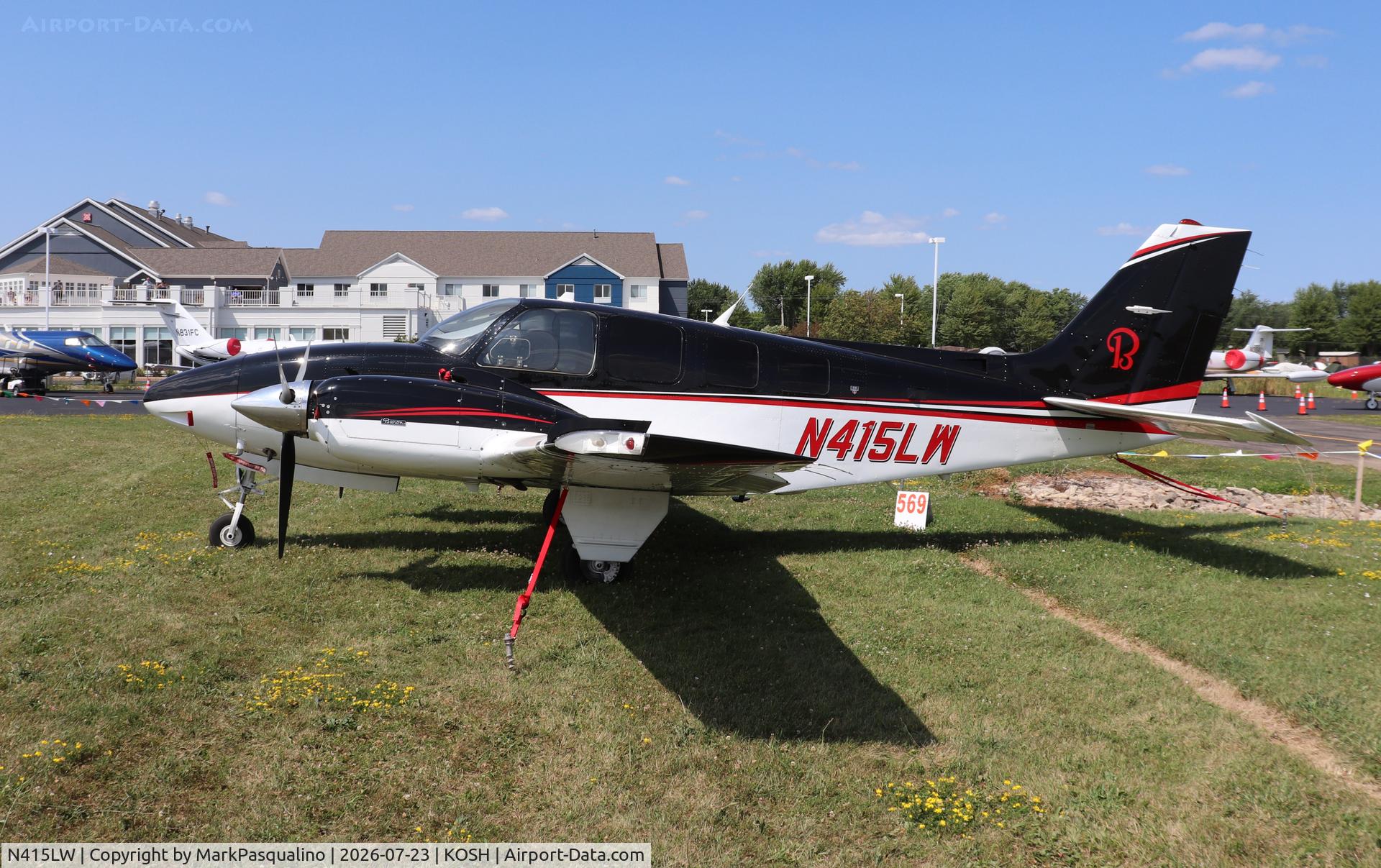Aircraft N415LW, 1984 Beech 58 Baron, c/n TH-1417, Beech 58, at KOSH, photo by MarkPasqualino