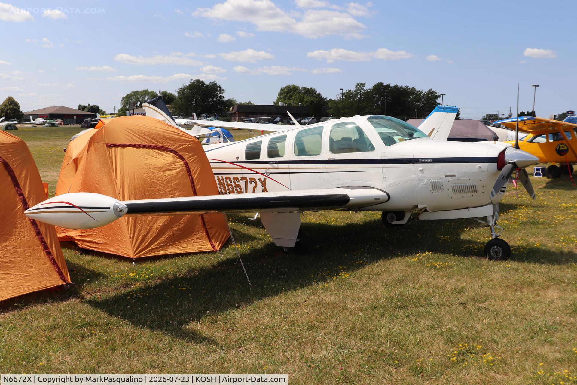 Aircraft N6672X, 1979 Beech A36TC Bonanza 36, c/n EA-32, Beech A36TC, at KOSH, photo by MarkPasqualino