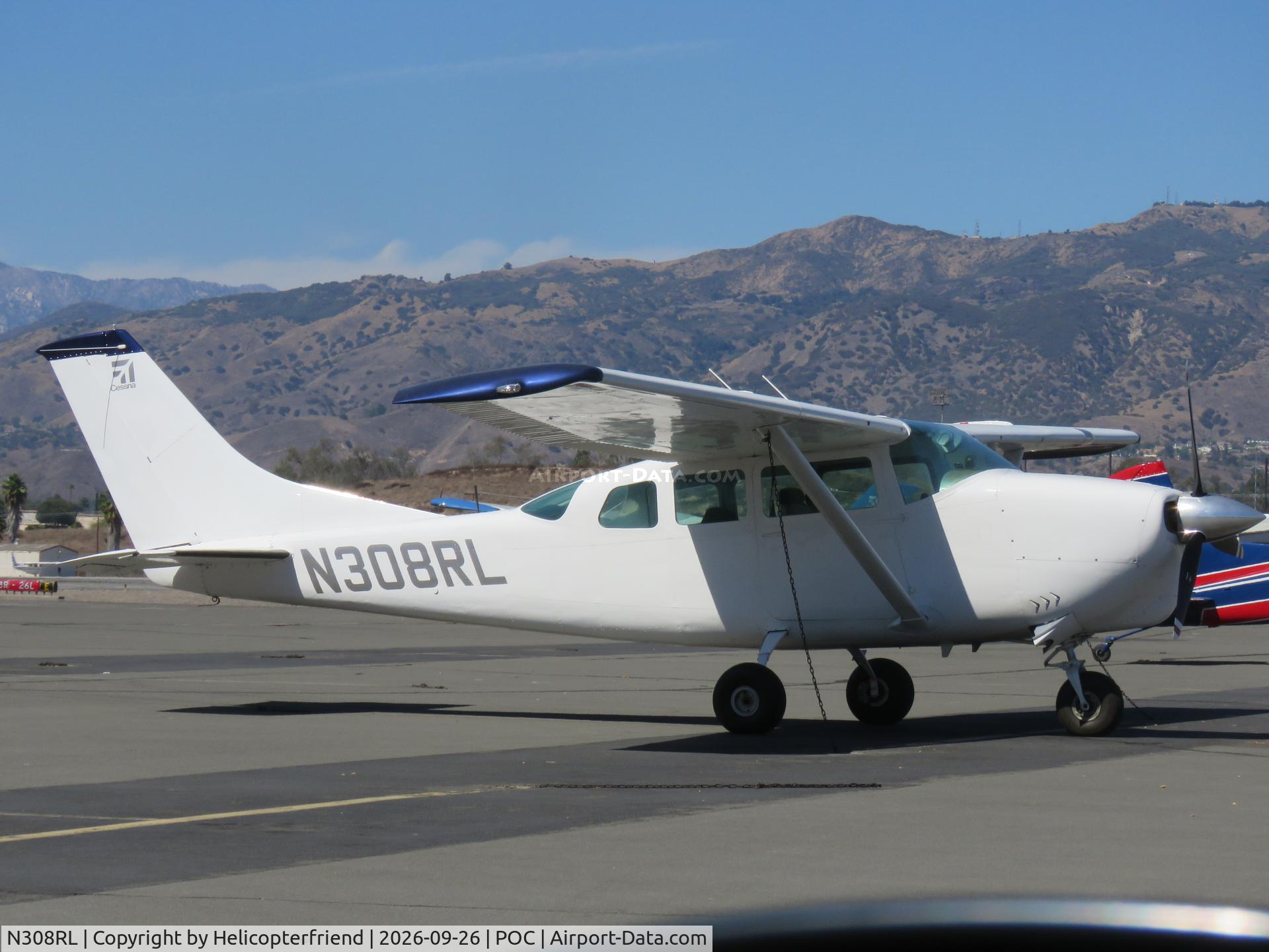 Aircraft N308RL, 1962 Cessna 210-5(205), c/n 205-0110, Parked in transit parking, at POC, photo by Helicopterfriend