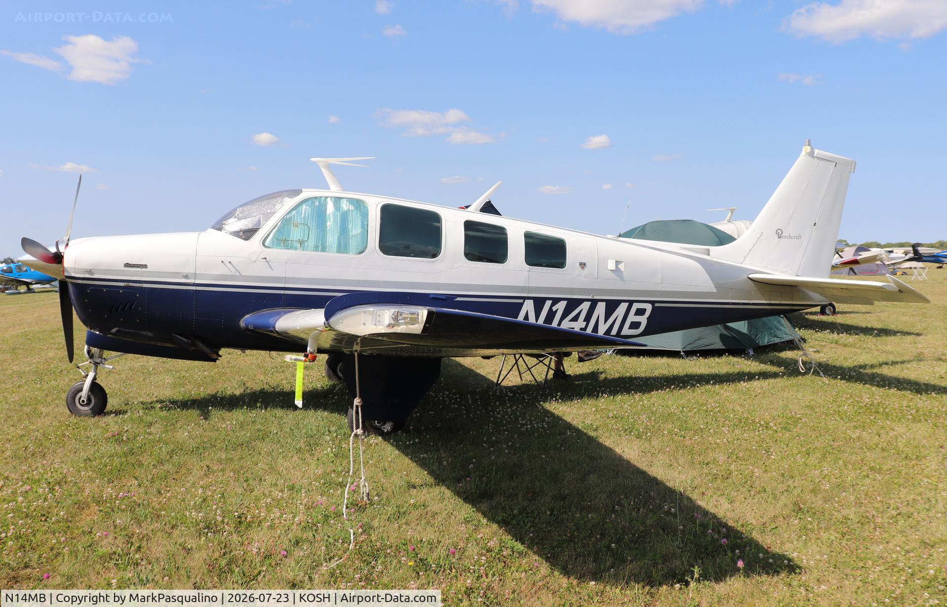 Aircraft N14MB, 1977 Beech A36 Bonanza 36, c/n E-1062, Beech A36, at KOSH, photo by MarkPasqualino