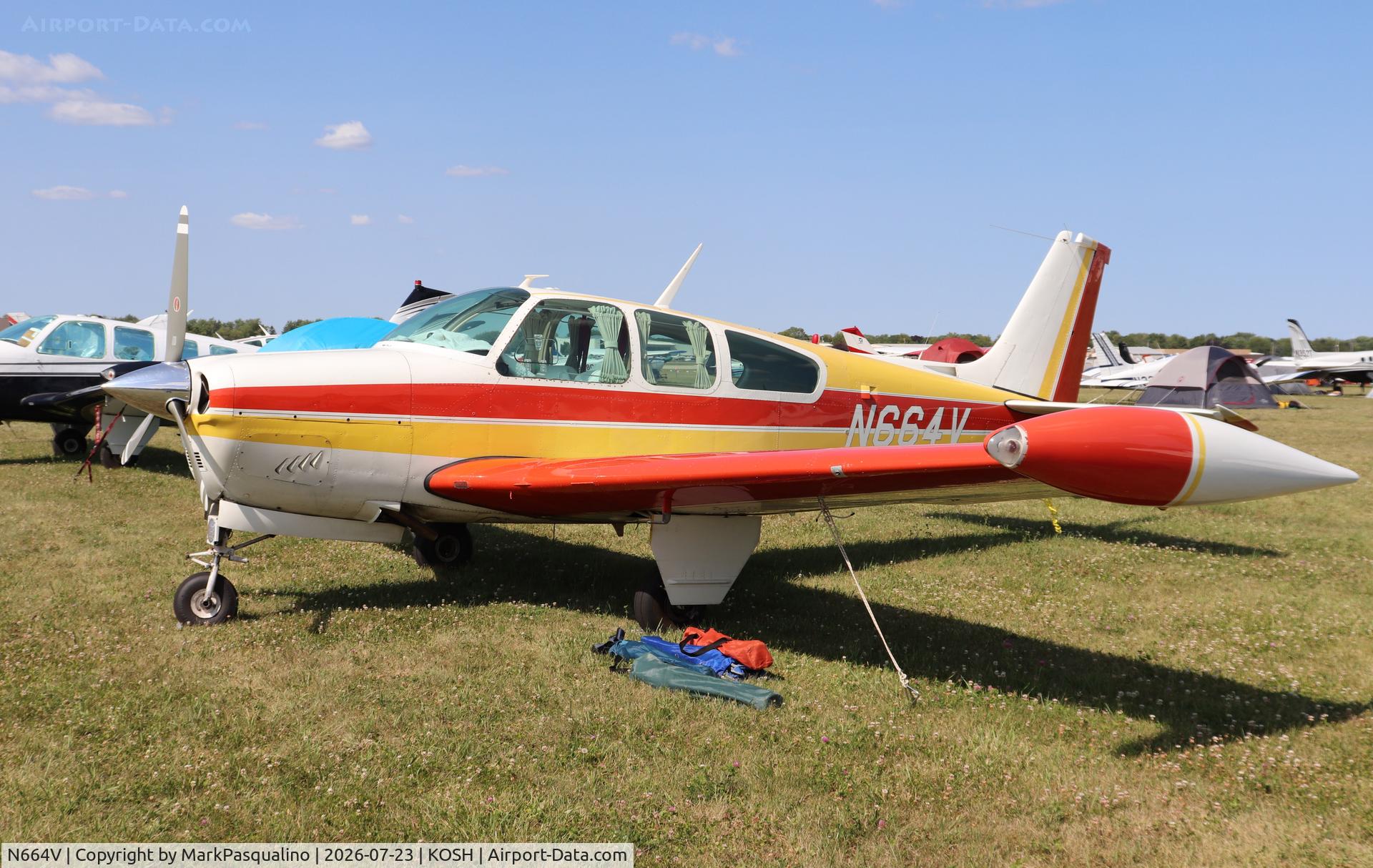Aircraft N664V, 1960 Beech 35-A33 Debonair, c/n CD-239, Beech A33, at KOSH, photo by MarkPasqualino