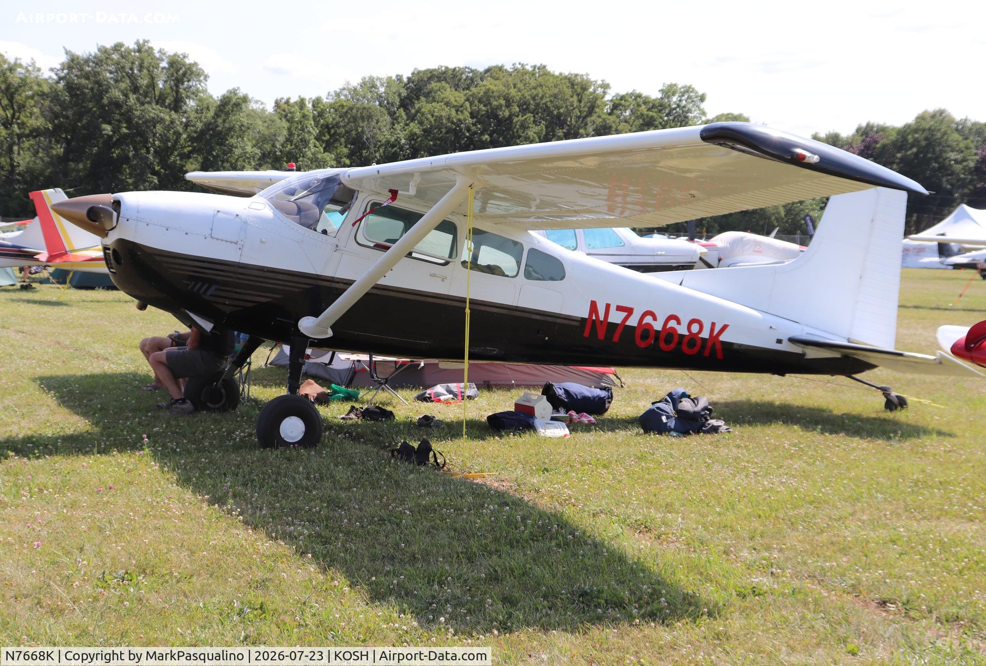 Aircraft N7668K, 1976 Cessna 180J, c/n 18052697, Cessna 180J, at KOSH, photo by MarkPasqualino