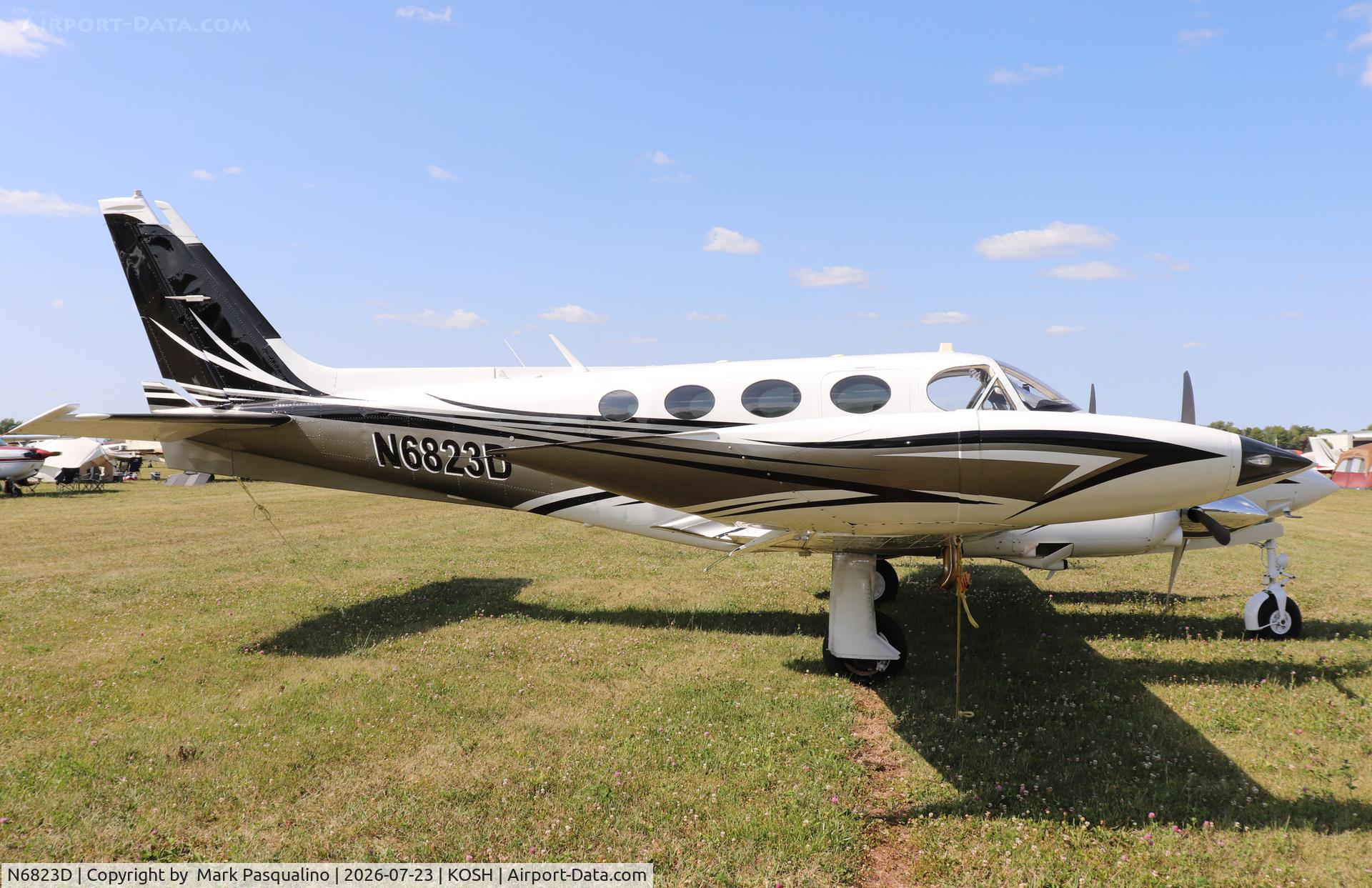 Aircraft N6823D, 1980 Cessna 340A, c/n 340A1042, Cessna 340A, at KOSH, photo by Mark Pasqualino