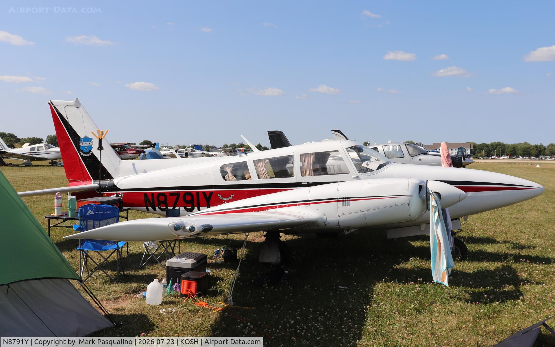 Aircraft N8791Y, 1969 Piper PA-30 Twin Comanche, c/n 30-1949, Piper PA-30, at KOSH, photo by Mark Pasqualino