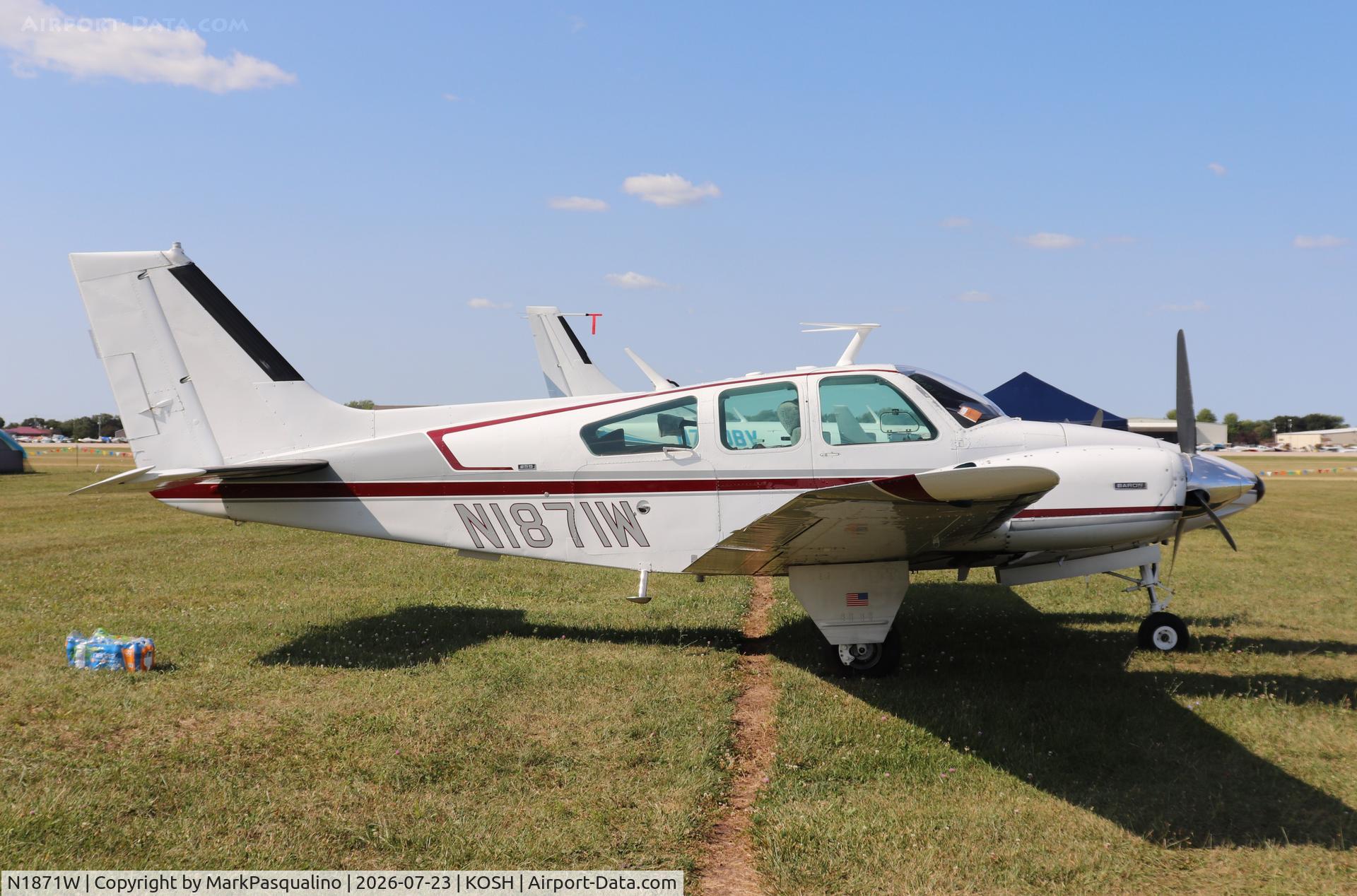 Aircraft N1871W, 1973 Beech 95-B55 (T42A) Baron, c/n TC-1563, Beech B55, at KOSH, photo by MarkPasqualino