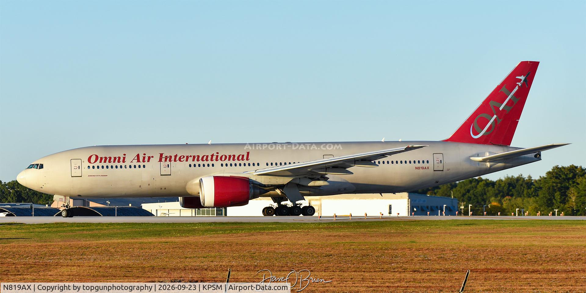 Aircraft N819AX, 2004 Boeing 777-2U8, c/n 33681, CAMBER510 make the quick refuel stop, at KPSM, photo by topgunphotography