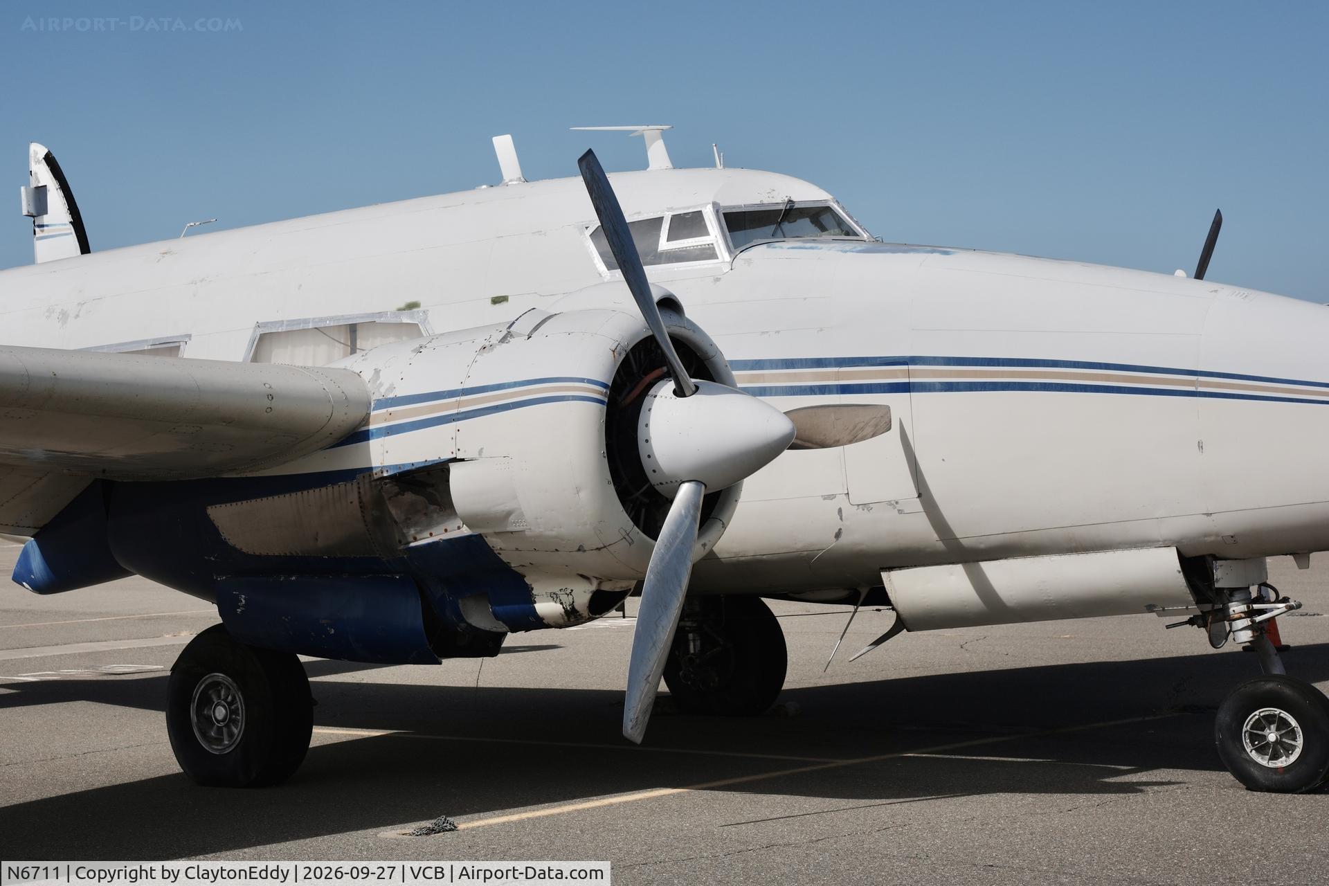 Aircraft N6711, 1966 Lockheed 18 Lodestar, c/n 2484, Vacaville Nut Tree airport in California 2026., at VCB, photo by ClaytonEddy