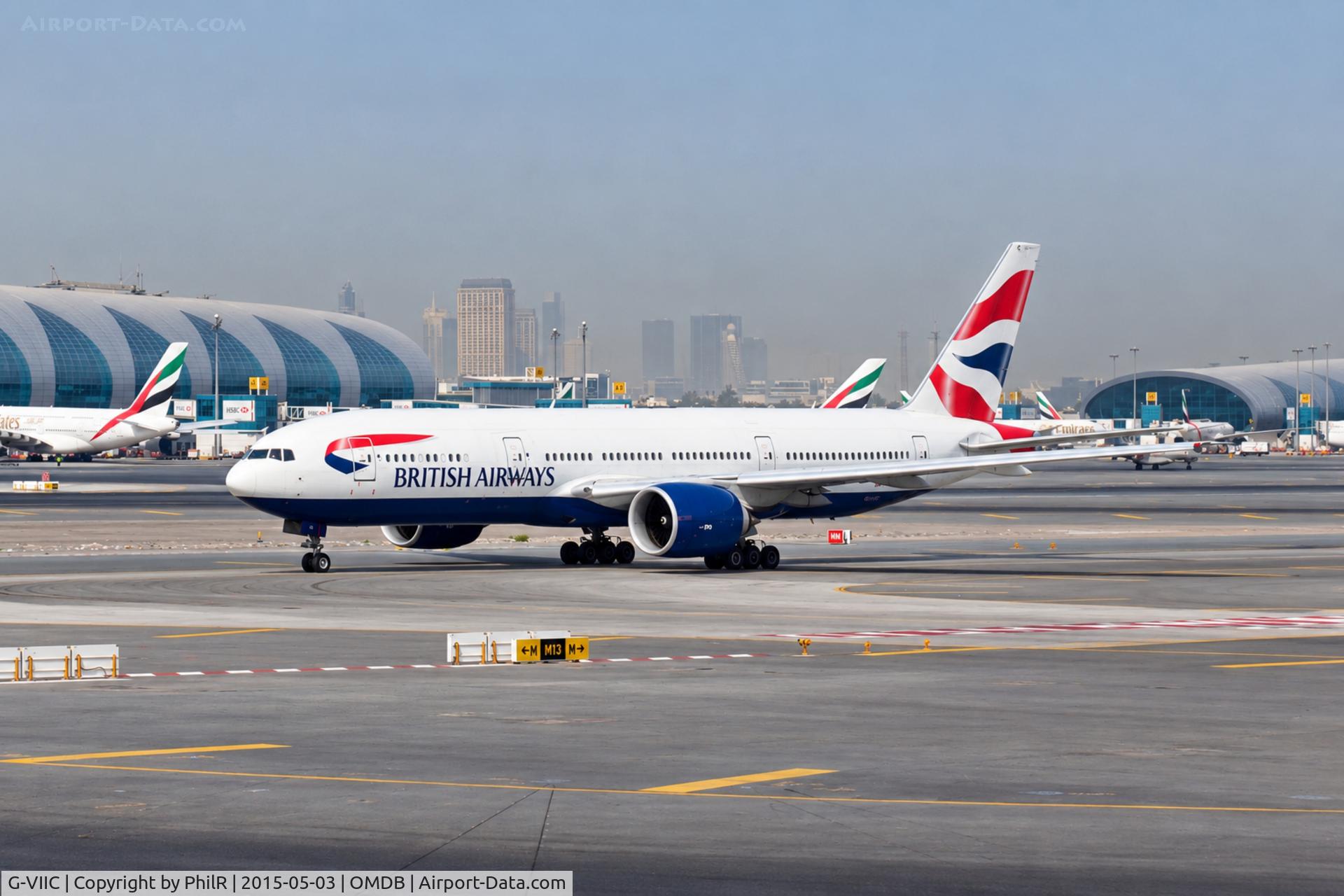 Aircraft G-VIIC, 1997 Boeing 777-236, c/n 27485, G-VIIC 1997 B777-200 BA DXB, at OMDB, photo by PhilR