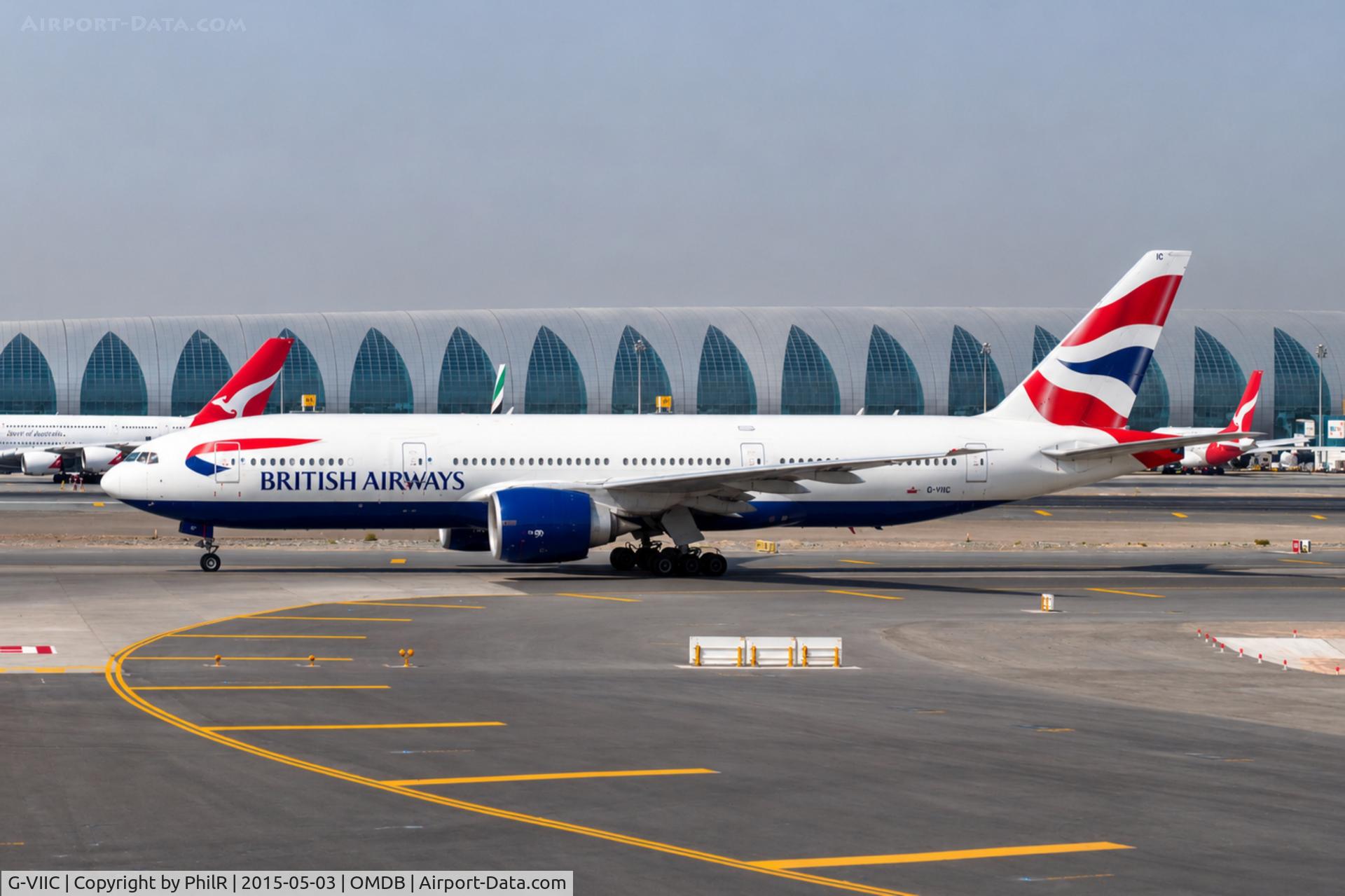 Aircraft G-VIIC, 1997 Boeing 777-236, c/n 27485, G-VIIC 1997 B777-200 BA DXB, at OMDB, photo by PhilR