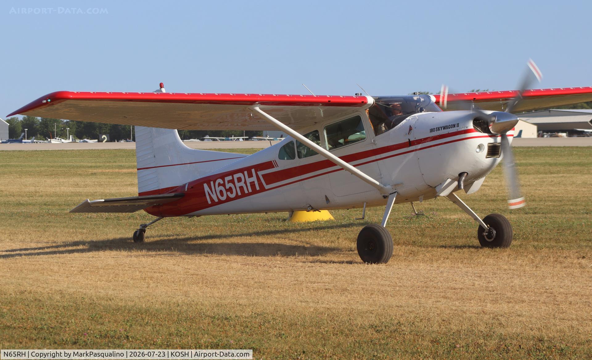 Aircraft N65RH, 1977 Cessna 180K Skywagon, c/n 18052869, Cessna 180K, at KOSH, photo by MarkPasqualino