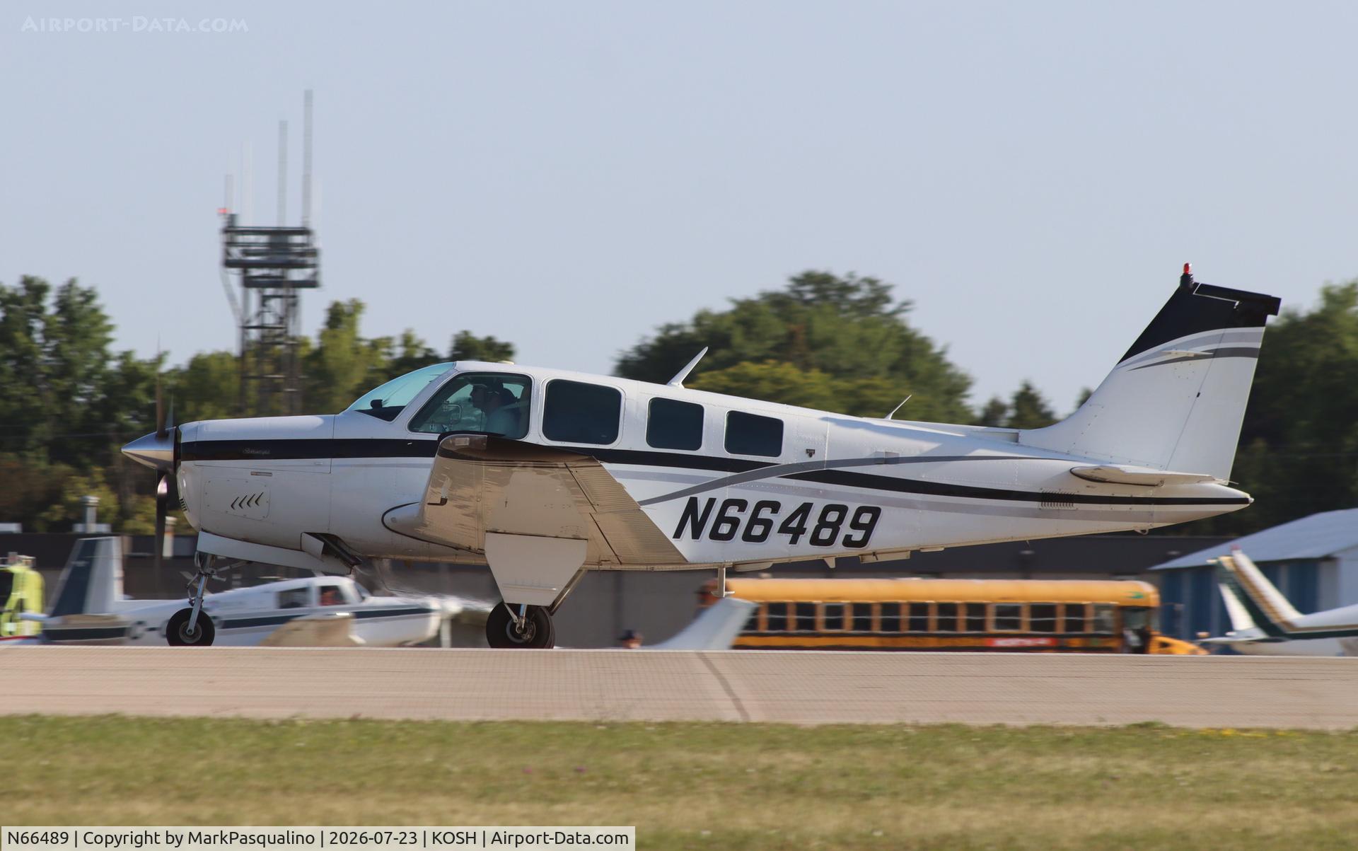Aircraft N66489, 1983 Beech A36 Bonanza 36, c/n E-2073, Beech A36, at KOSH, photo by MarkPasqualino