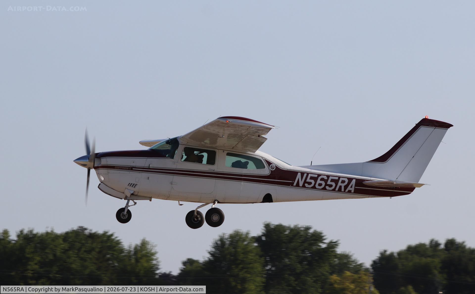 Aircraft N565RA, 1977 Cessna T210M Turbo Centurion, c/n 21062347, Cessna T210M, at KOSH, photo by MarkPasqualino