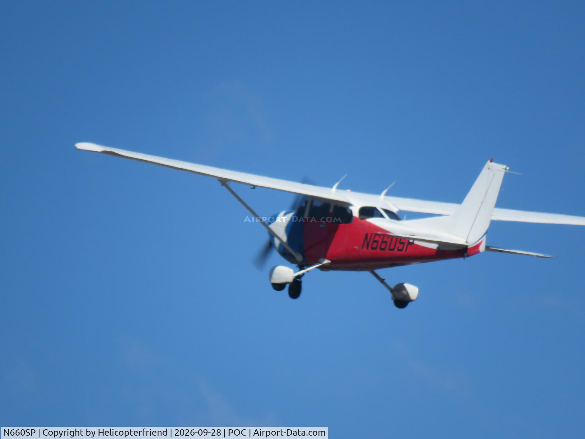 Aircraft N660SP, 1998 Cessna 172S, c/n 172S8065, Climbing out westbound, at POC, photo by Helicopterfriend
