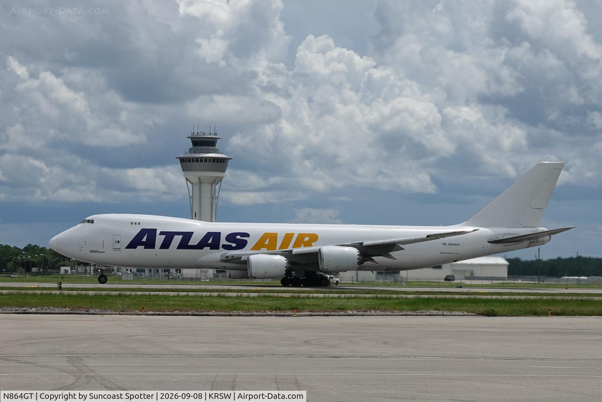 Aircraft N864GT, 2014 Boeing 747-83QF, c/n 60117, Giant 8904 Heavy departs Southwest Florida International Airport enroute to Miami International Airport following a weather diversion, at KRSW, photo by Suncoast Spotter