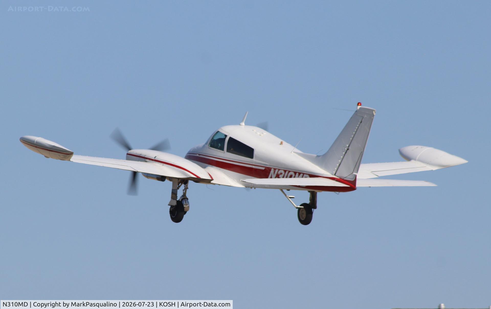 Aircraft N310MD, 1968 Cessna 310N, c/n 310N-0119, Cessna 310N, at KOSH, photo by MarkPasqualino