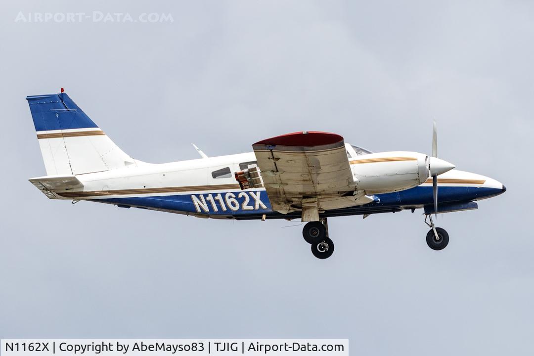 Aircraft N1162X, 1975 Piper PA-34 200T Seneca II, c/n 34-7570225, Departing to the islands, at TJIG, photo by AbeMayso83